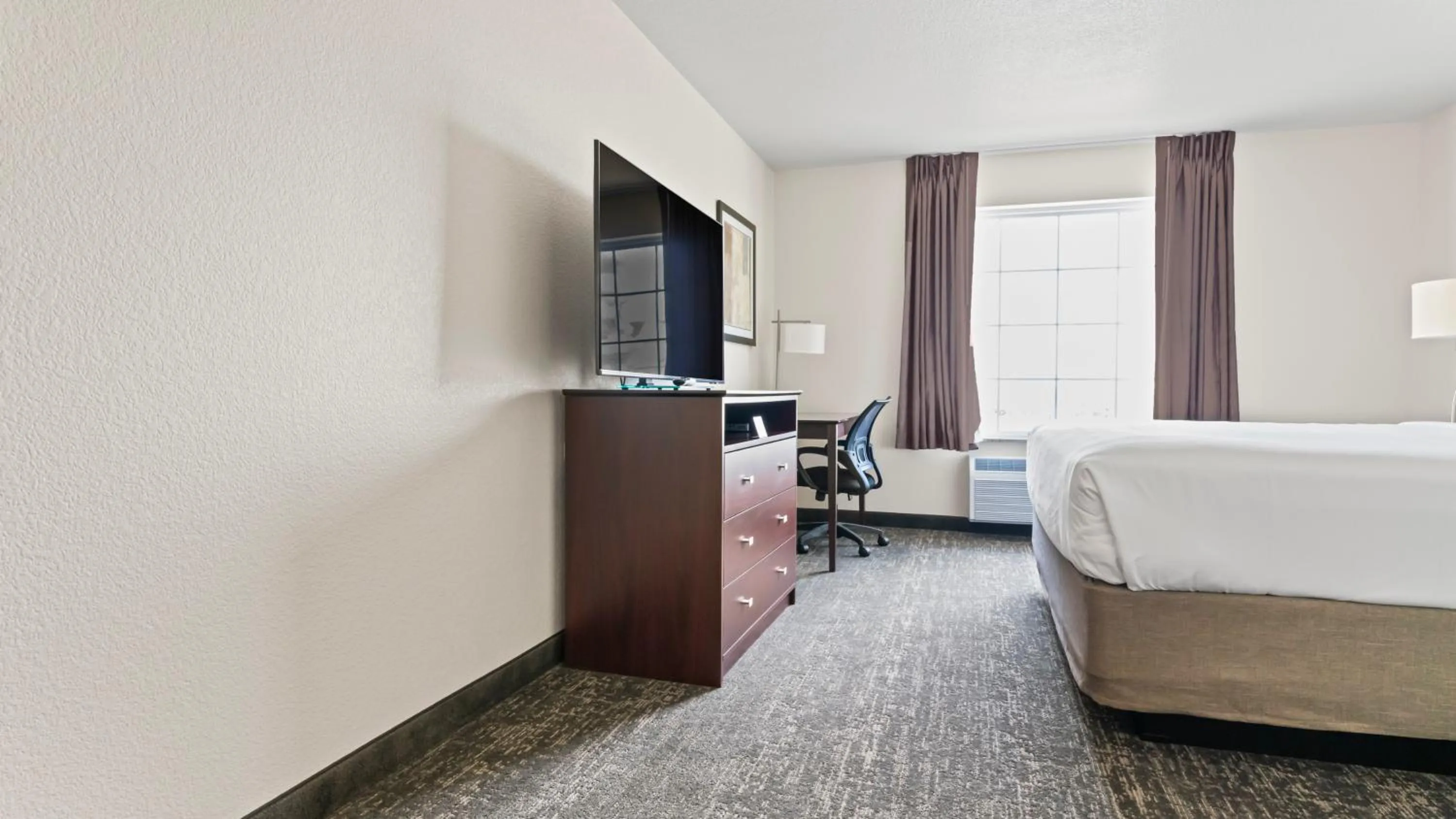 Bedroom, Bed in Cobblestone Inn & Suites - Julesburg