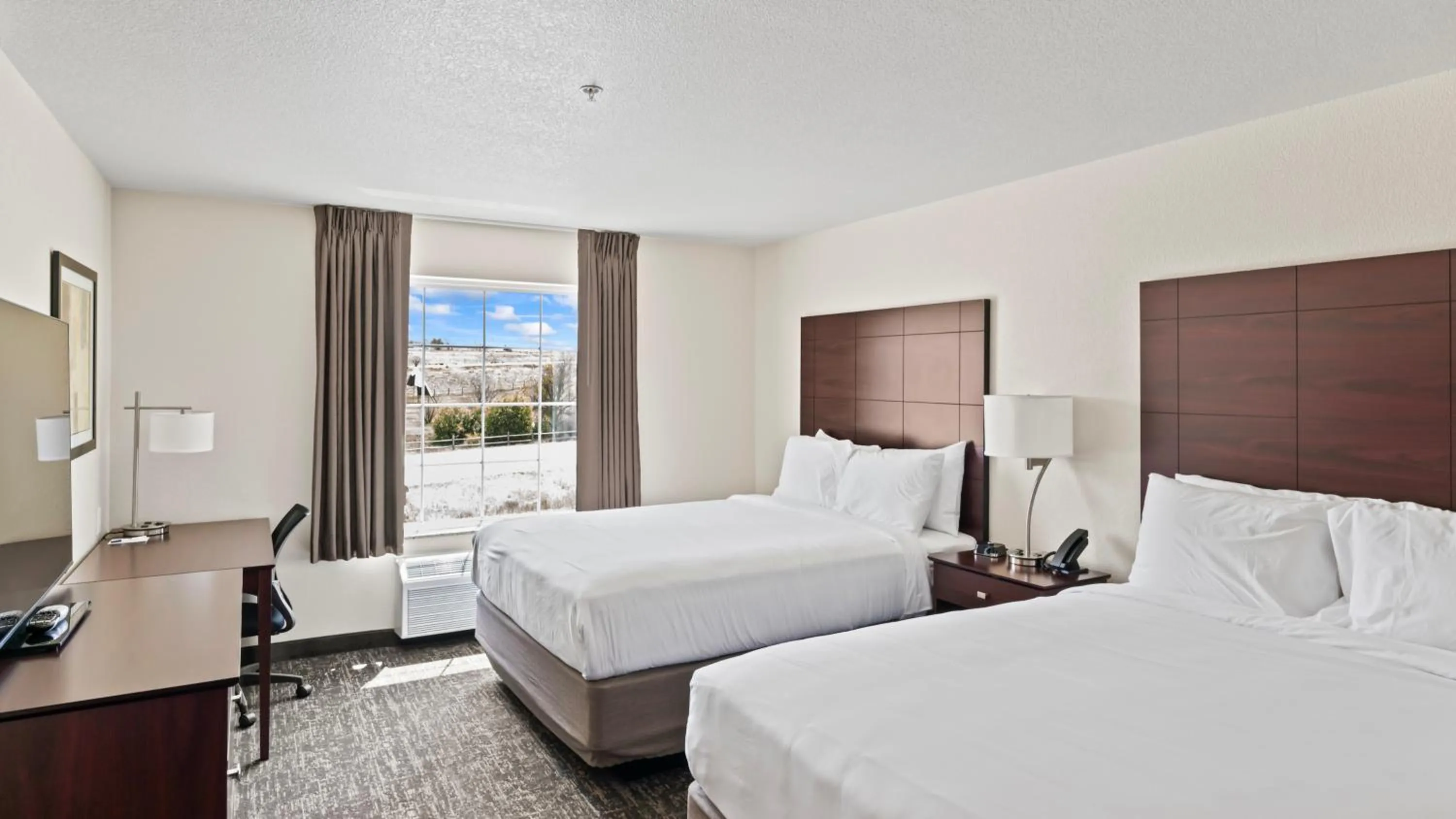 Bed in Cobblestone Inn & Suites - Julesburg