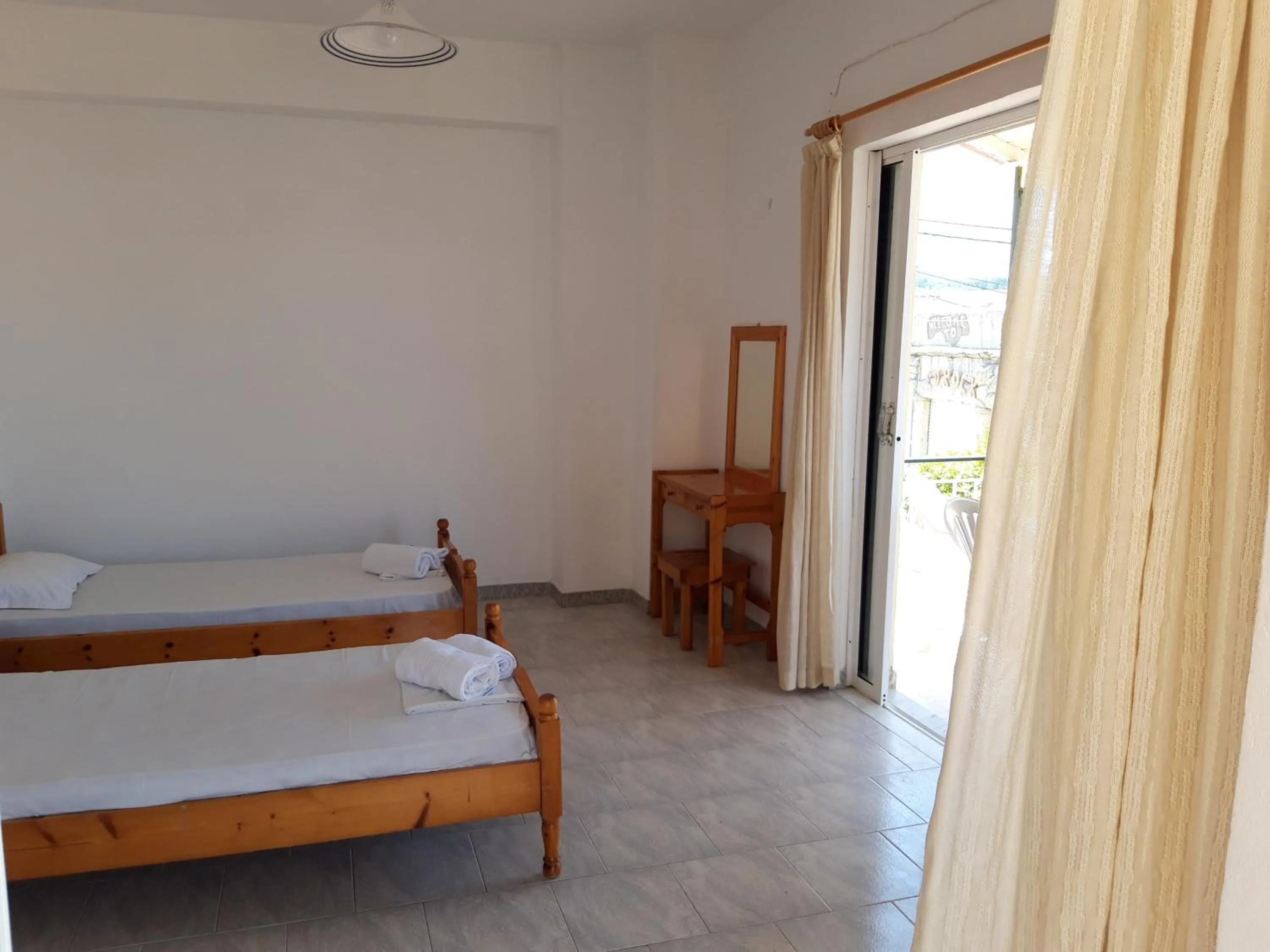 Bed in Kavos Central Gardens