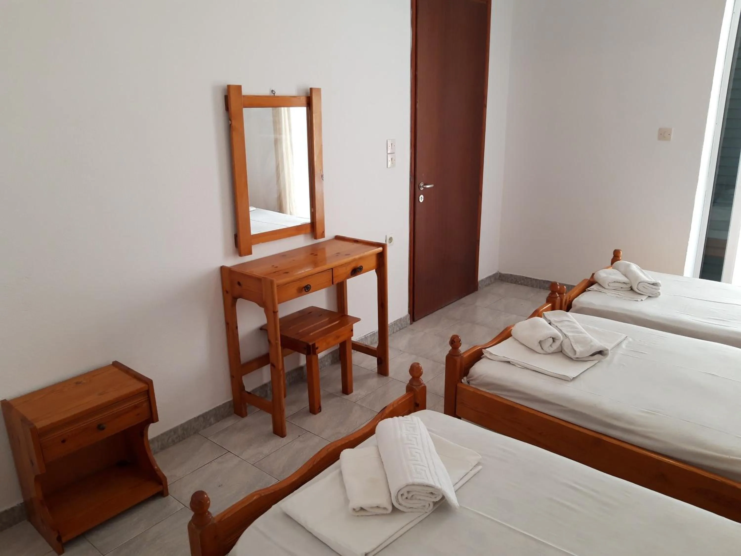 Bed in Kavos Central Gardens