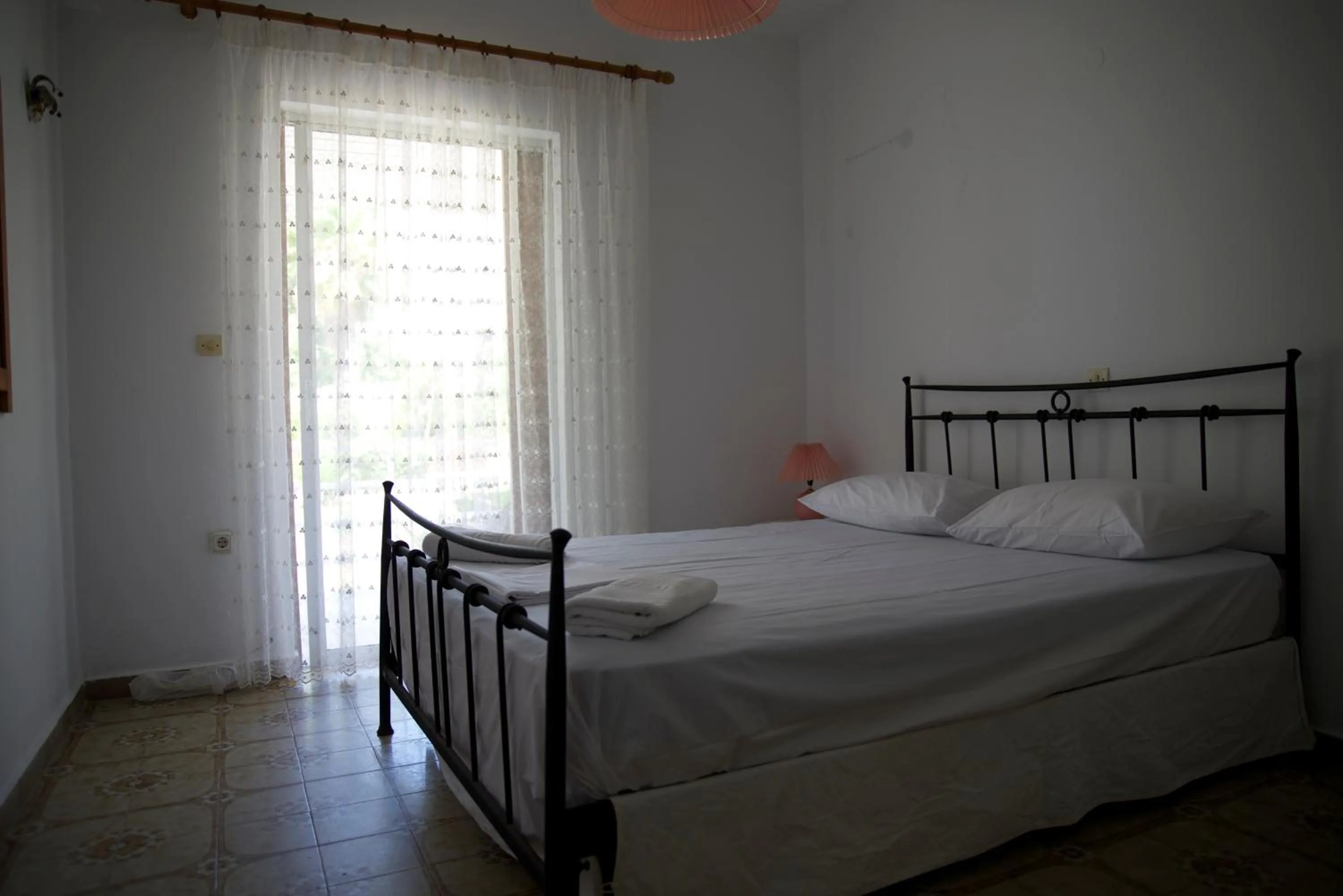 Bed in Kavos Central Gardens