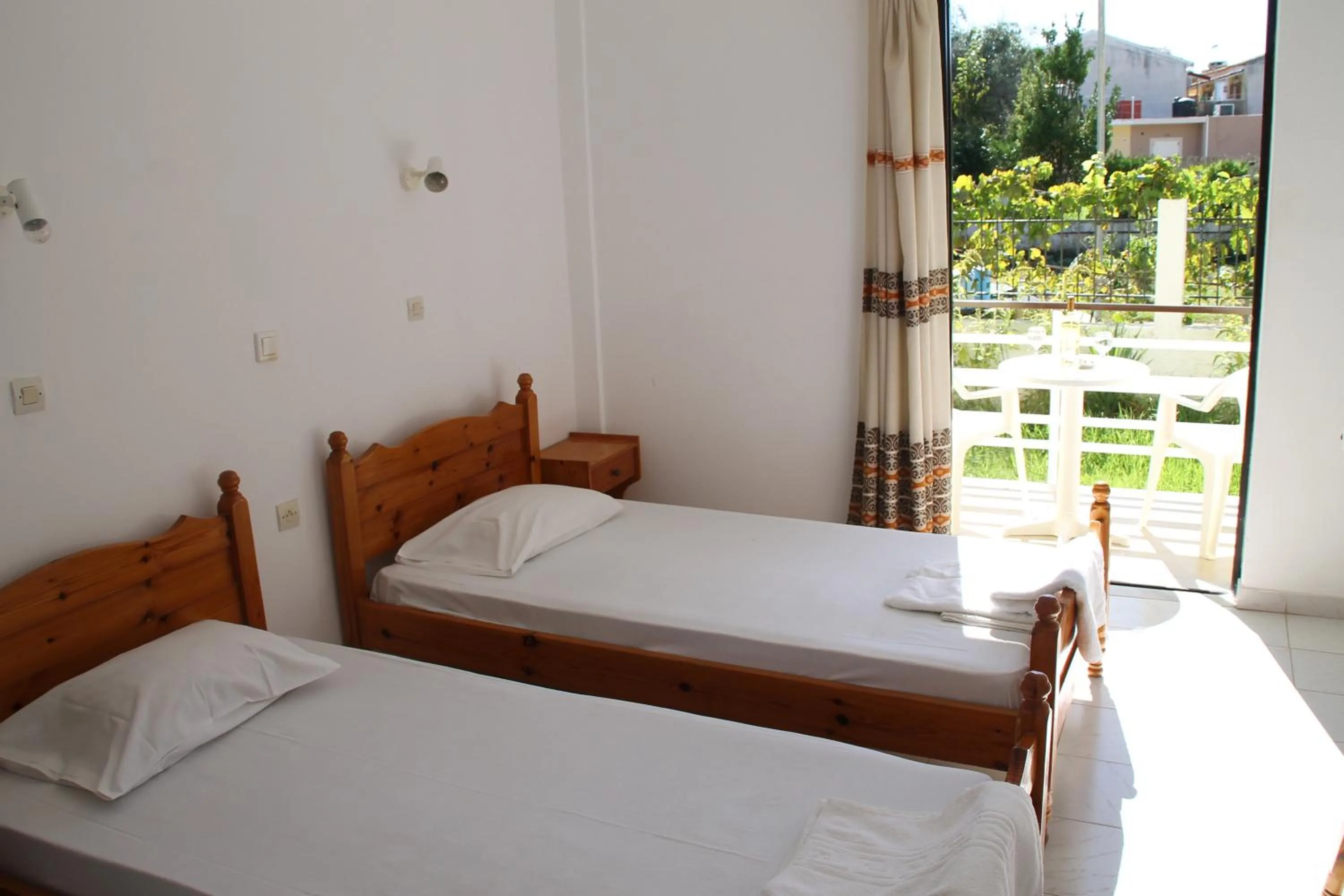 Garden view, Bed in Kavos Central Gardens