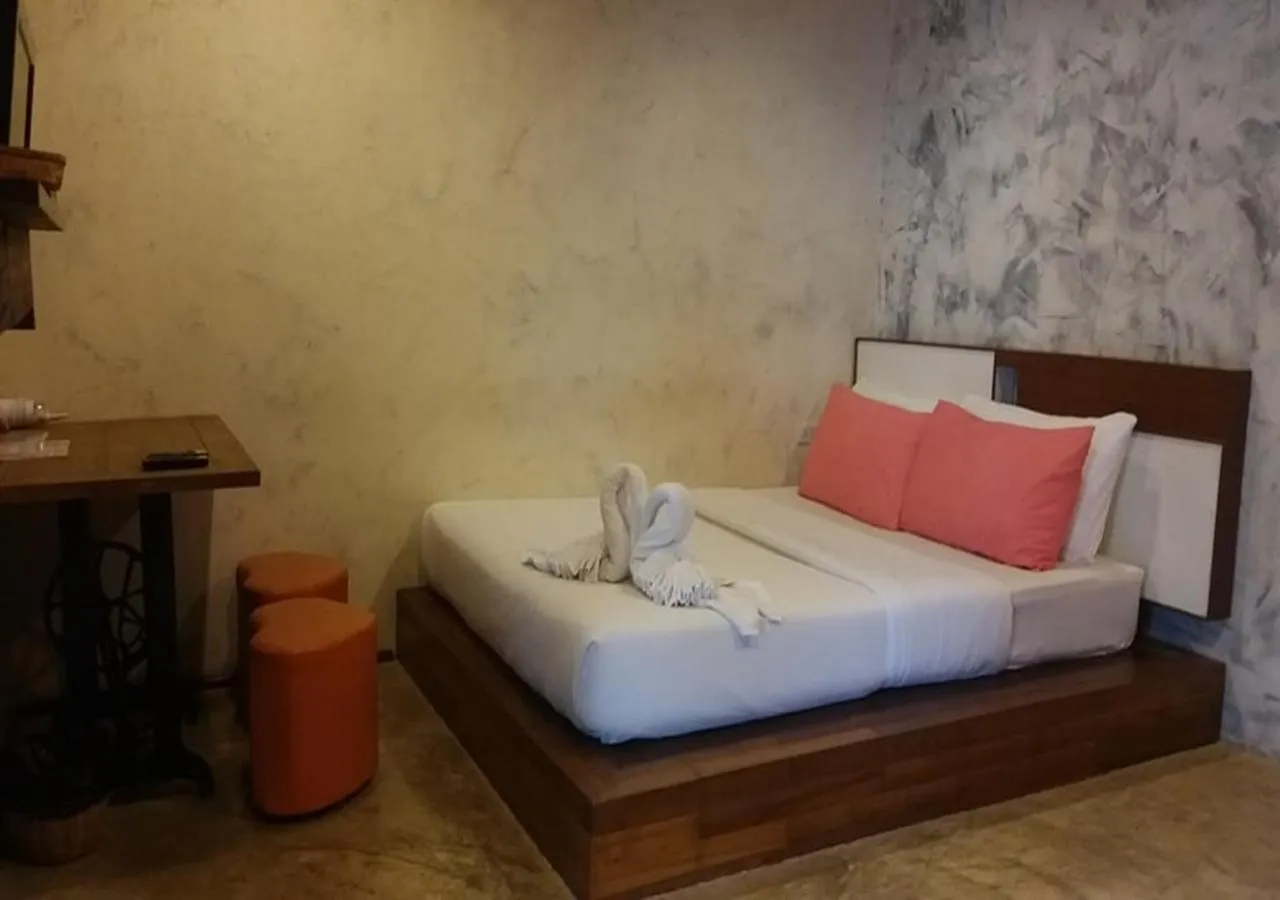 Bed in BaanChompooAmphawa