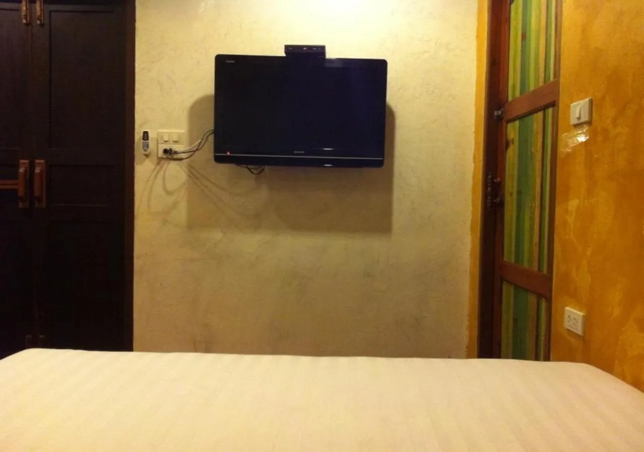 Bed in BaanChompooAmphawa