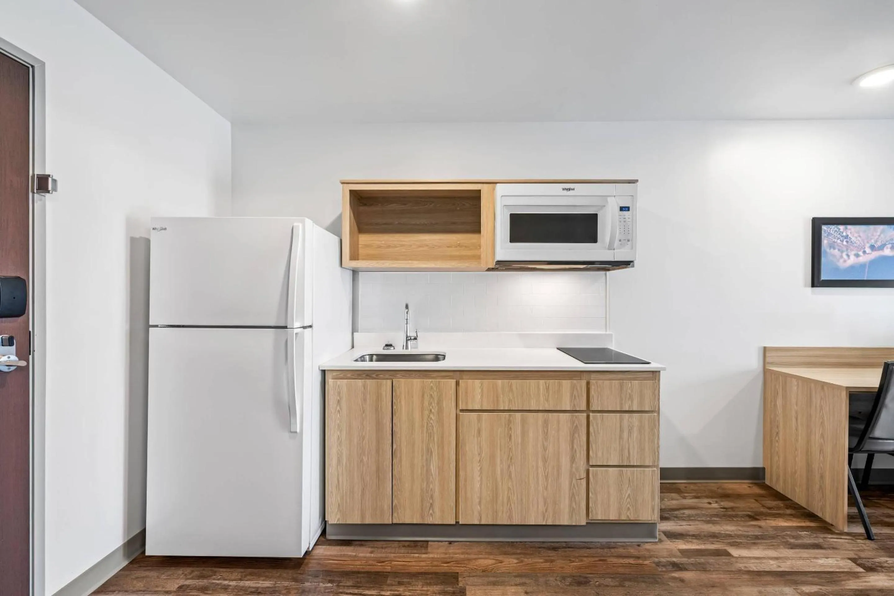 Bedroom in WoodSpring Suites Winston-Salem near Hanes Mall