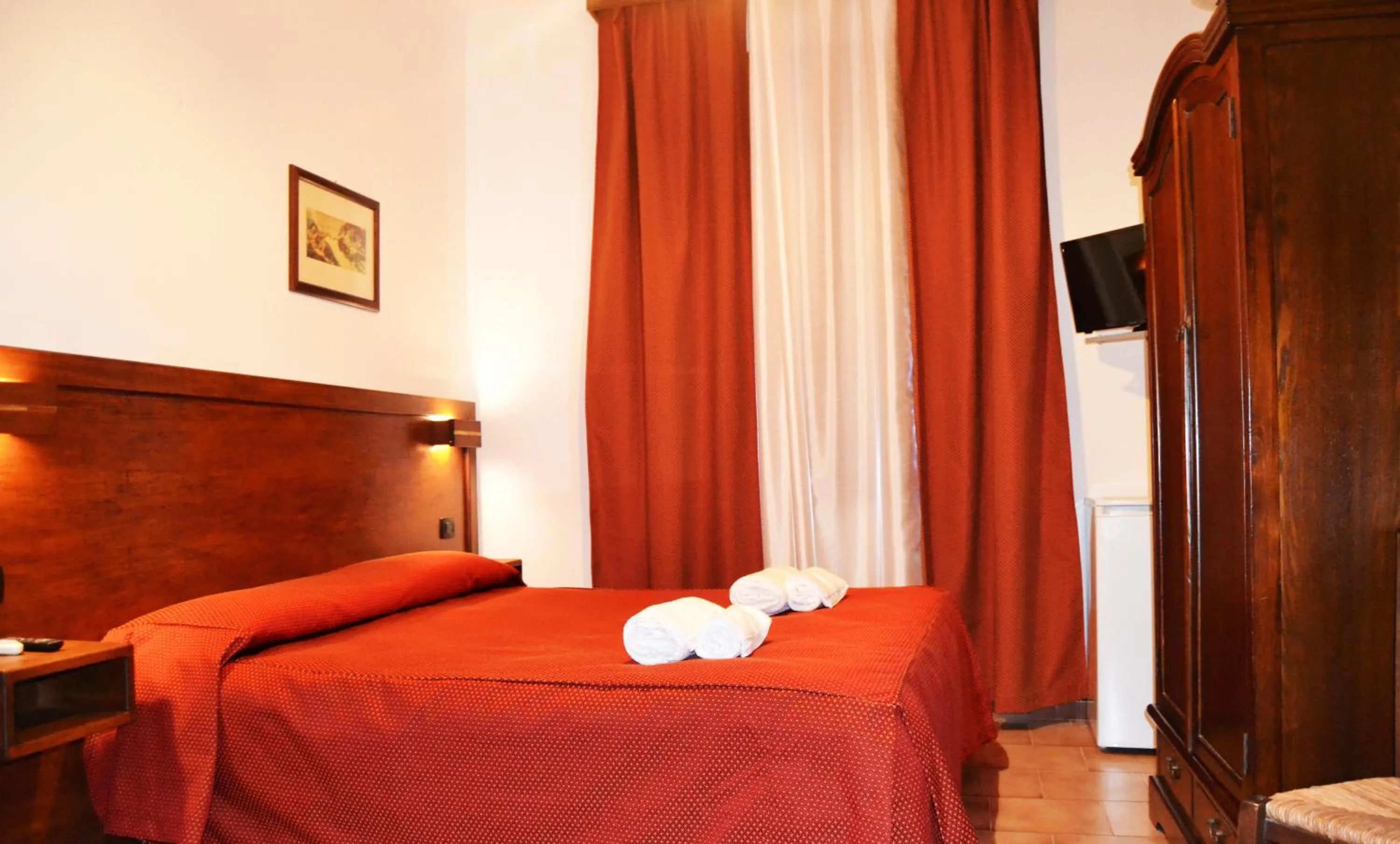 Bed in Brunelli Residence