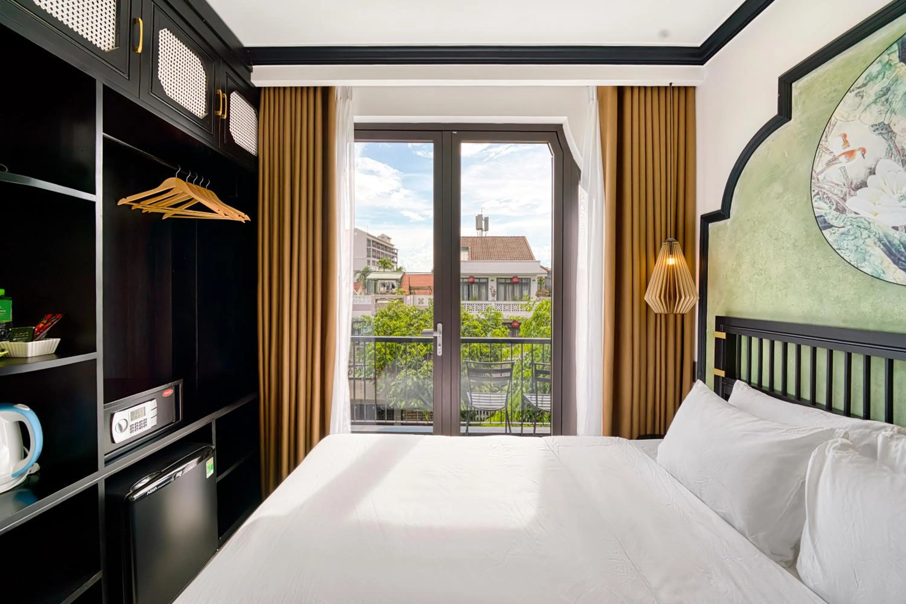 Bed in Rokas Hoi An Boutique Hotel