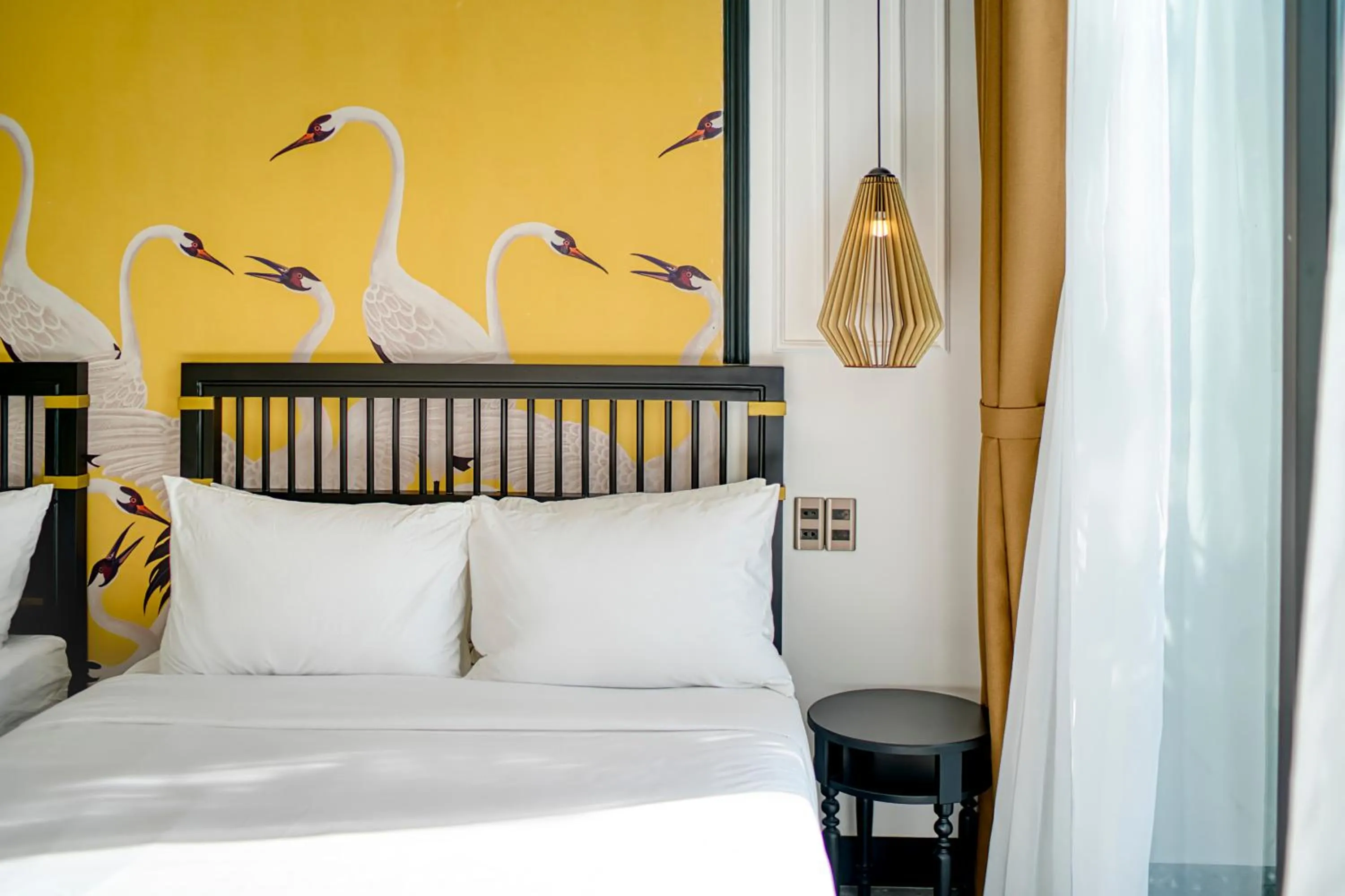 Bed in Rokas Hoi An Boutique Hotel