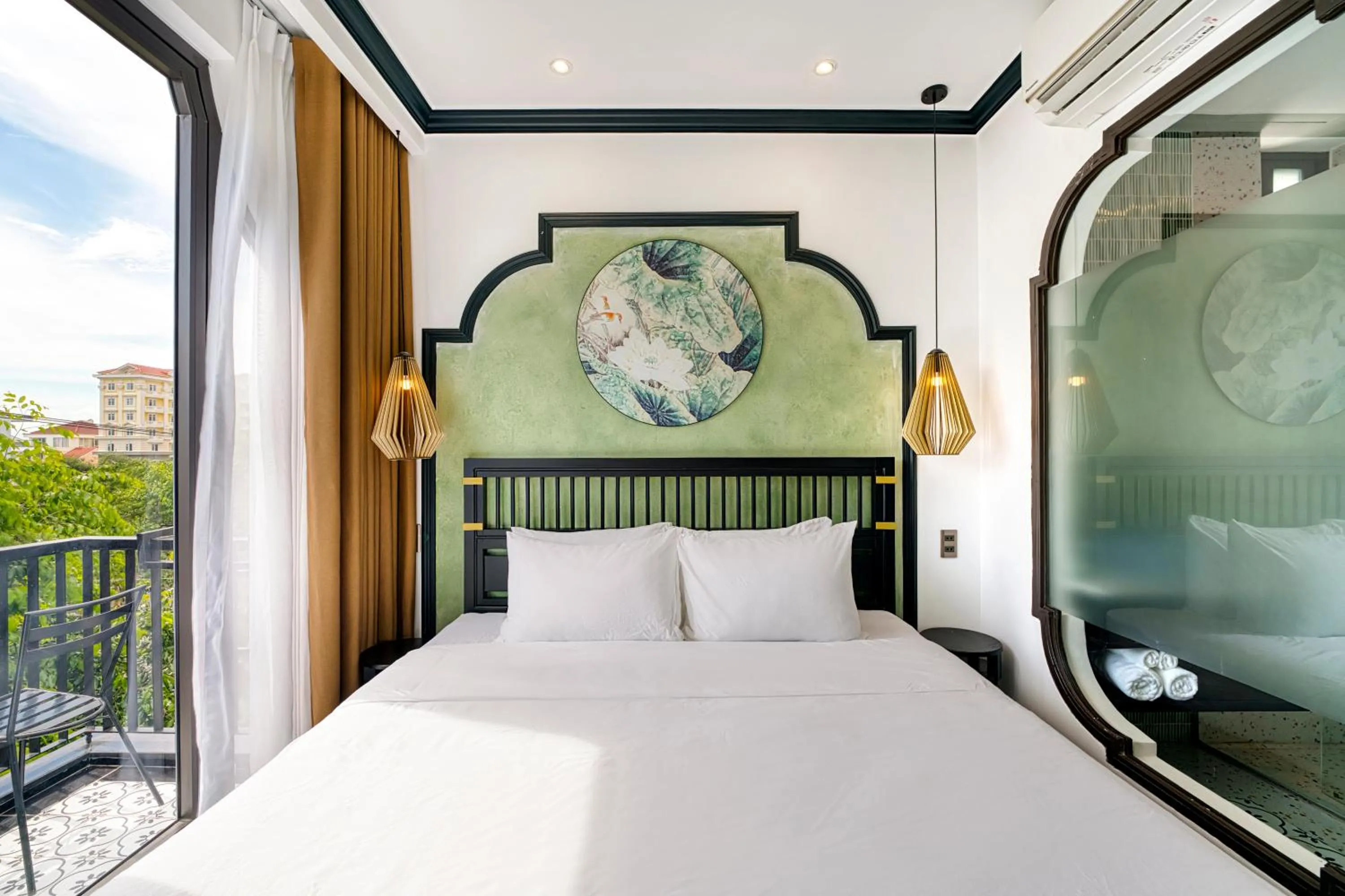 Bed in Rokas Hoi An Boutique Hotel