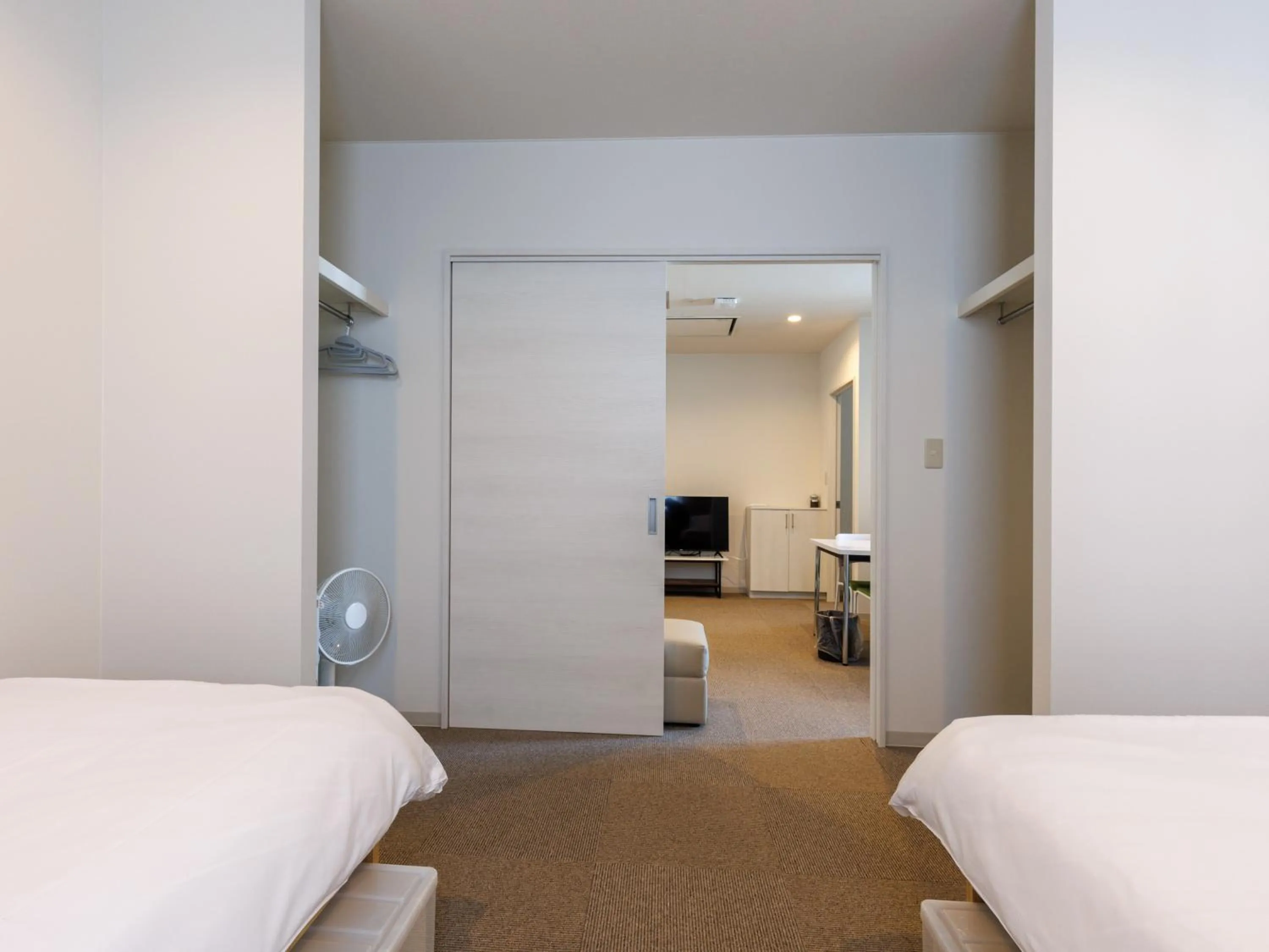 Bed in Tabist Kitami Athlete Stays