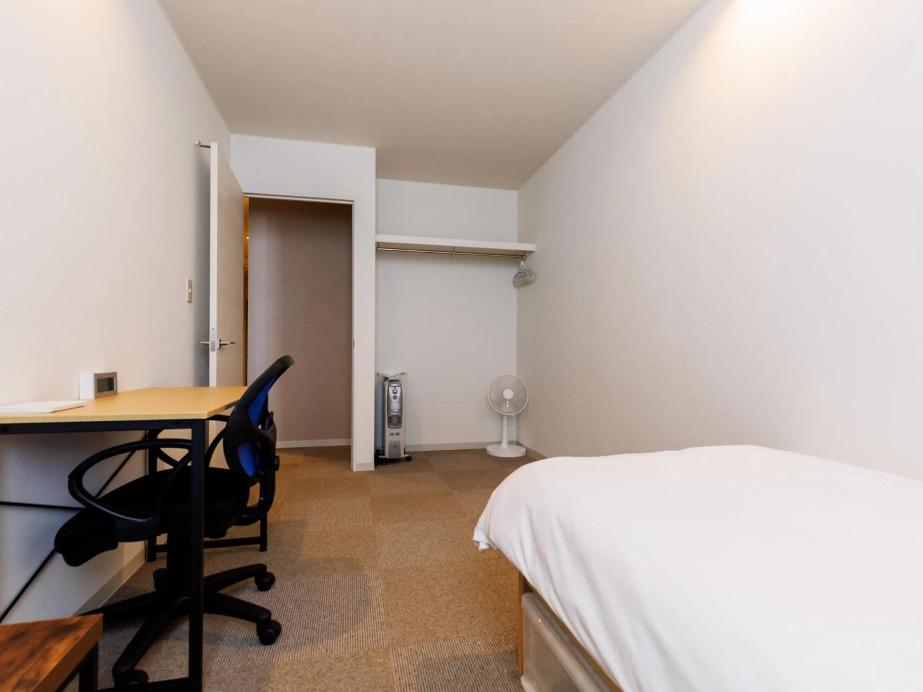 Bed in Tabist Kitami Athlete Stays