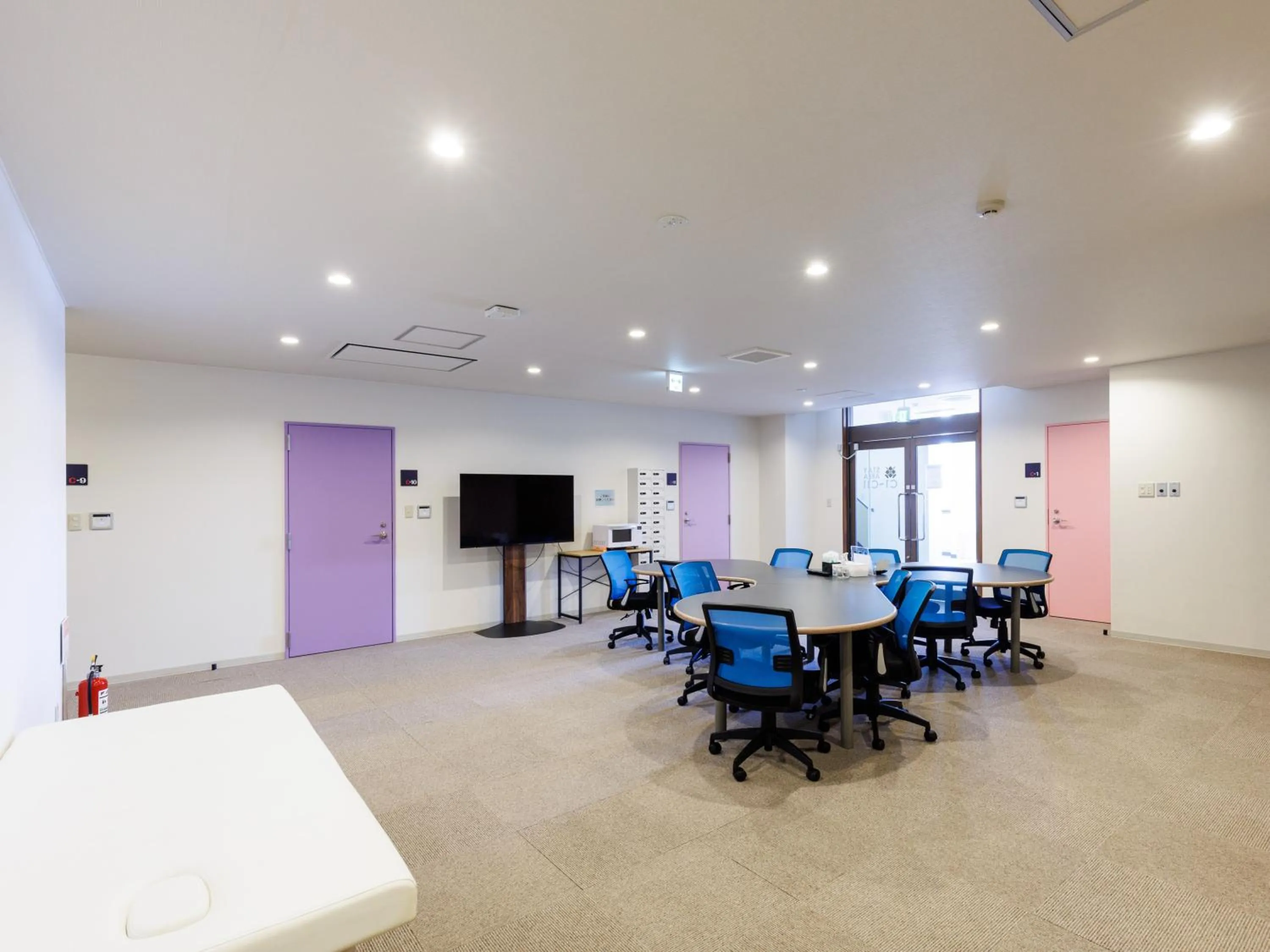 Communal lounge/ TV room in Tabist Kitami Athlete Stays