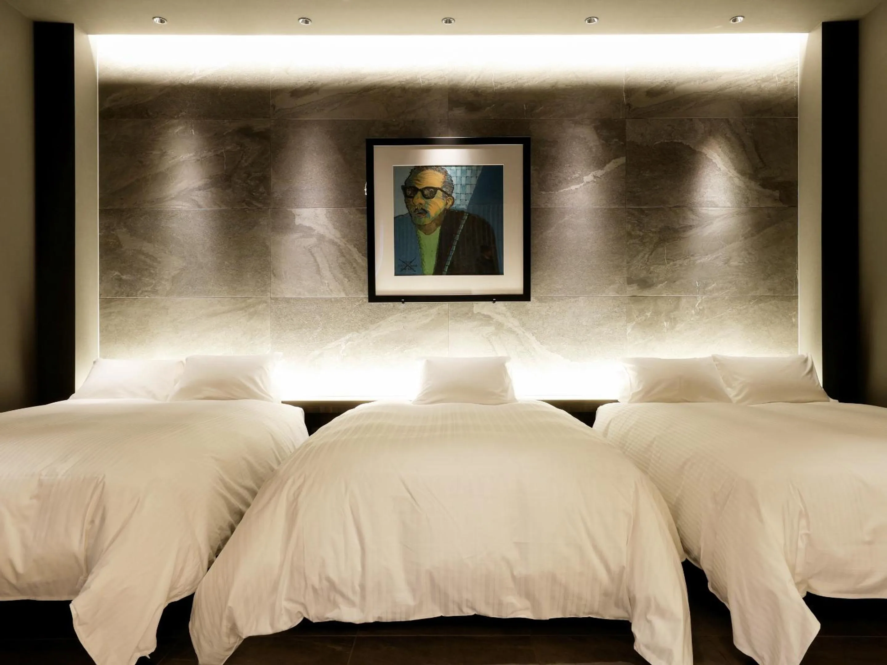 Bed in FIVE SPRING RESORT THE SHIRAHAMA