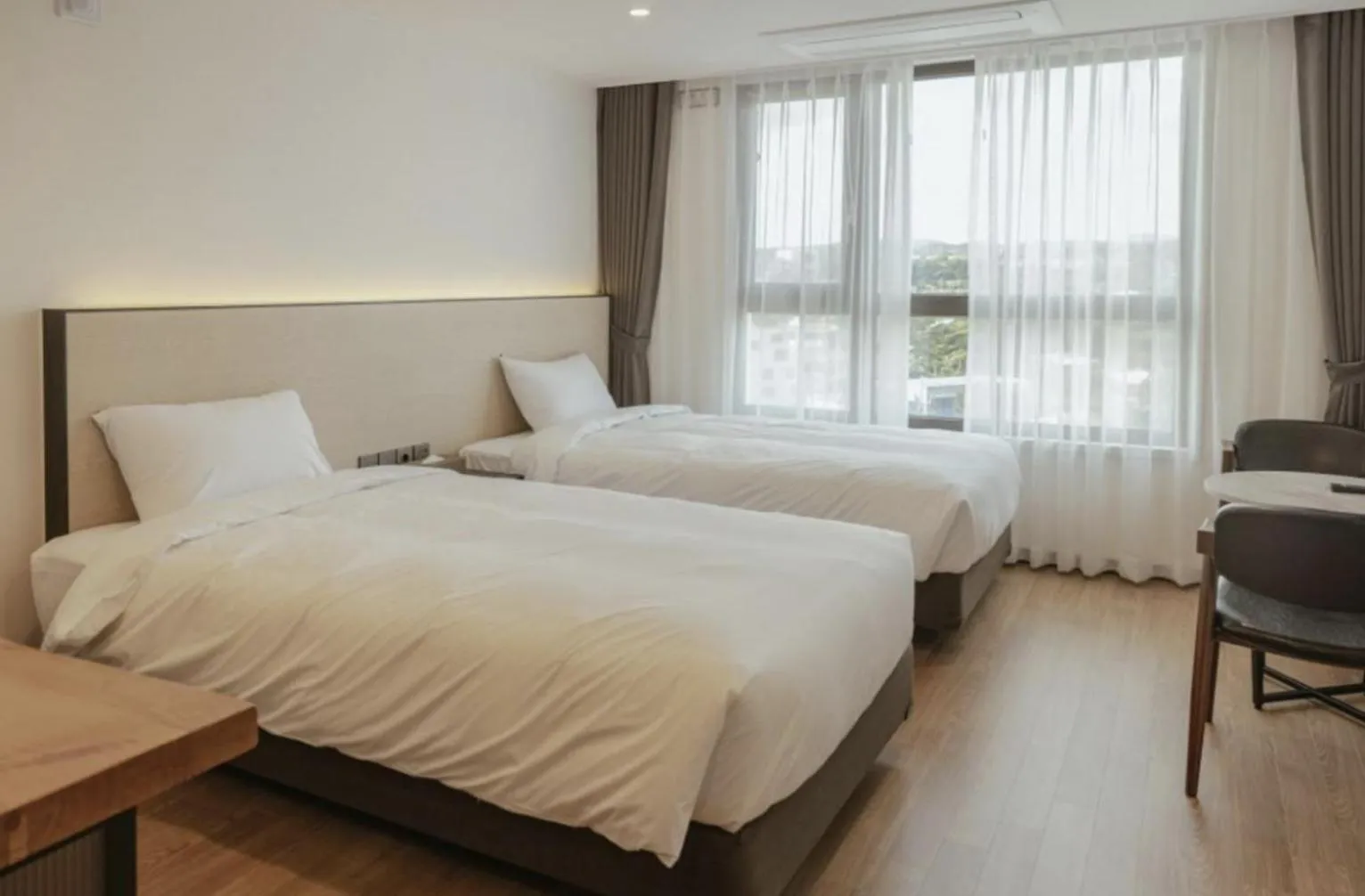 Bed in Lemain Hotel Seogwipo