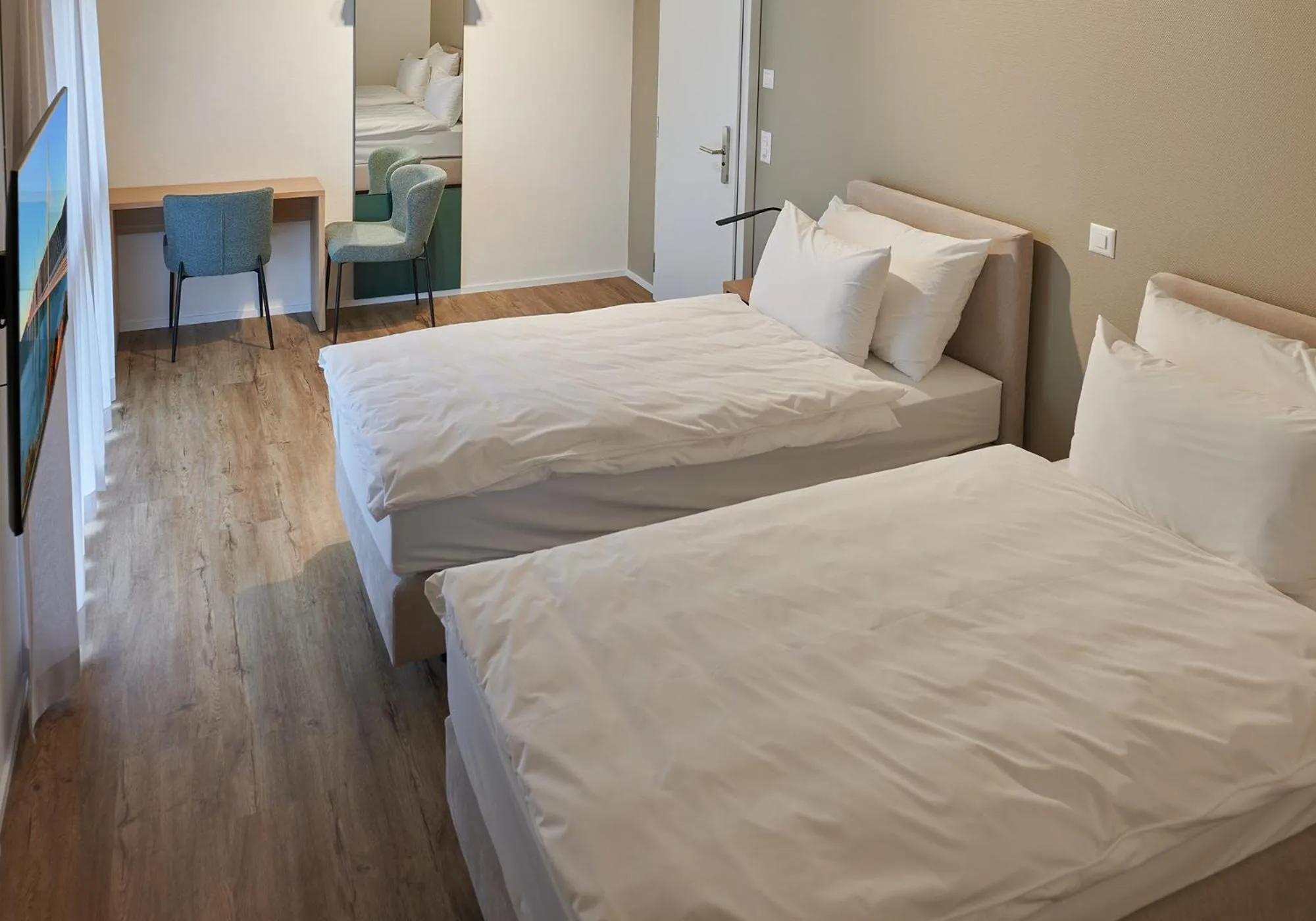 Bed in Hotel Jäger Jeuss - Murten - Self-Check-in