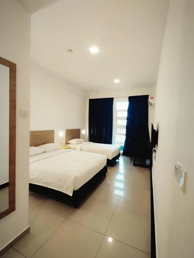 Bed in BIG TREE HOTEL