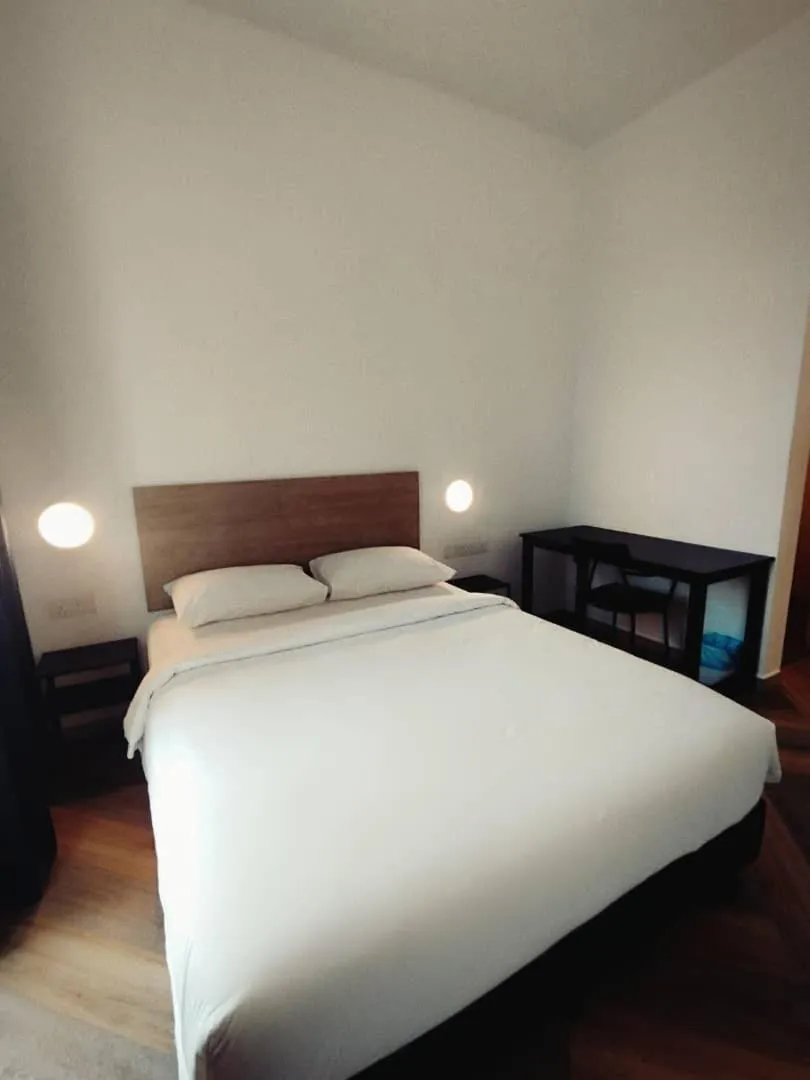 Bed in BIG TREE HOTEL