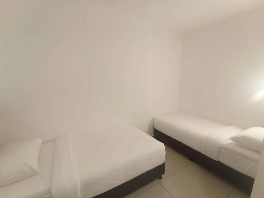 Bed in BIG TREE HOTEL