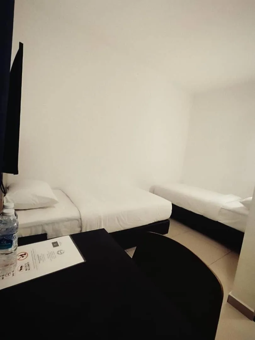 Bed in BIG TREE HOTEL