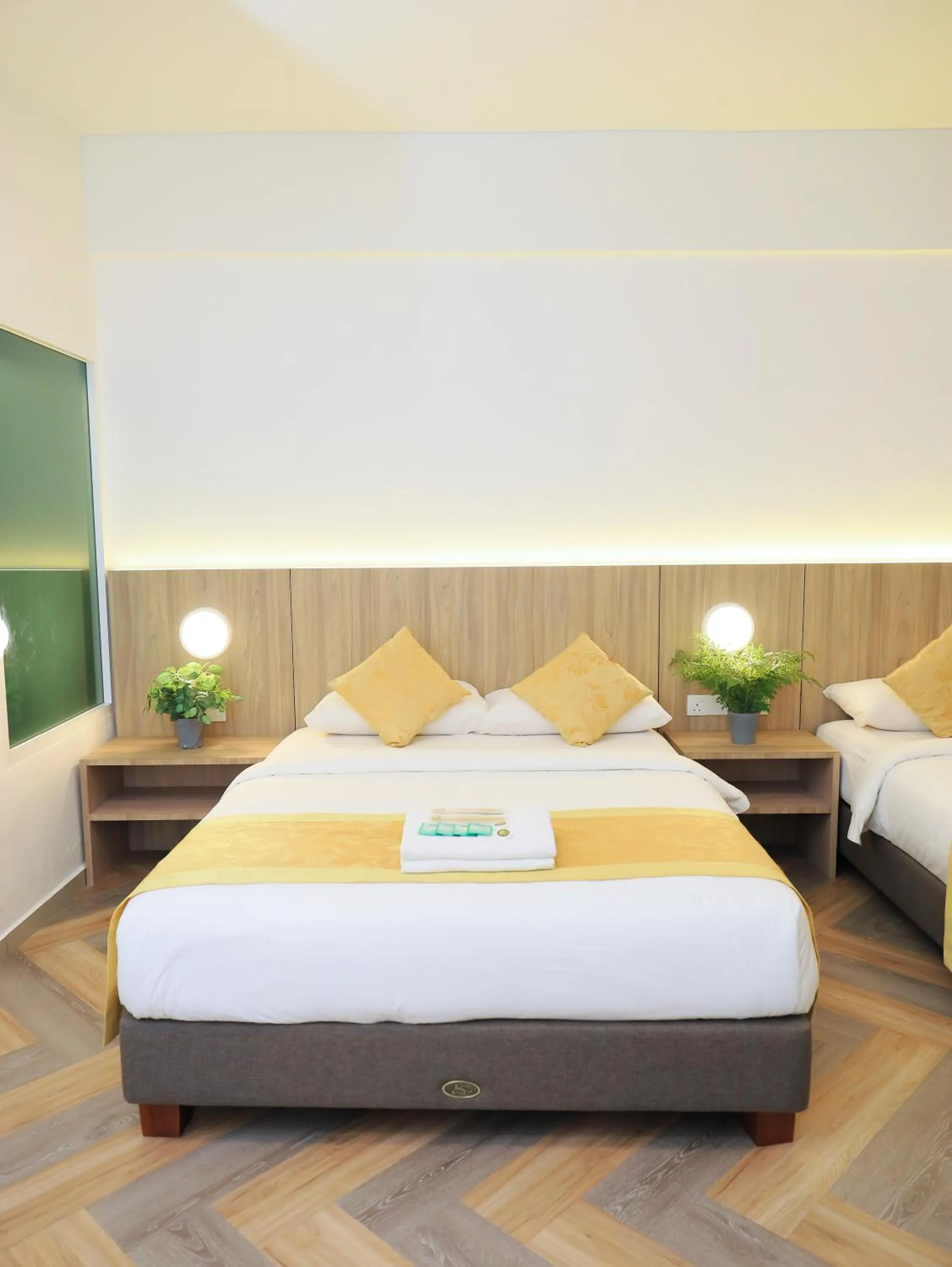 Bed in BIG TREE HOTEL