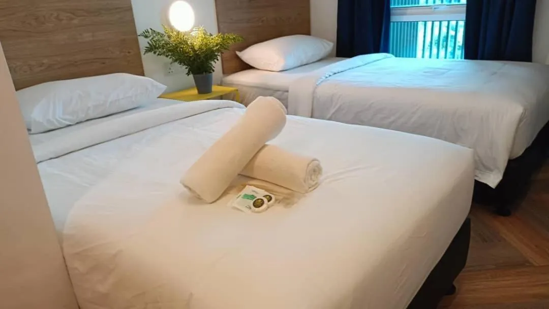 Bed in BIG TREE HOTEL