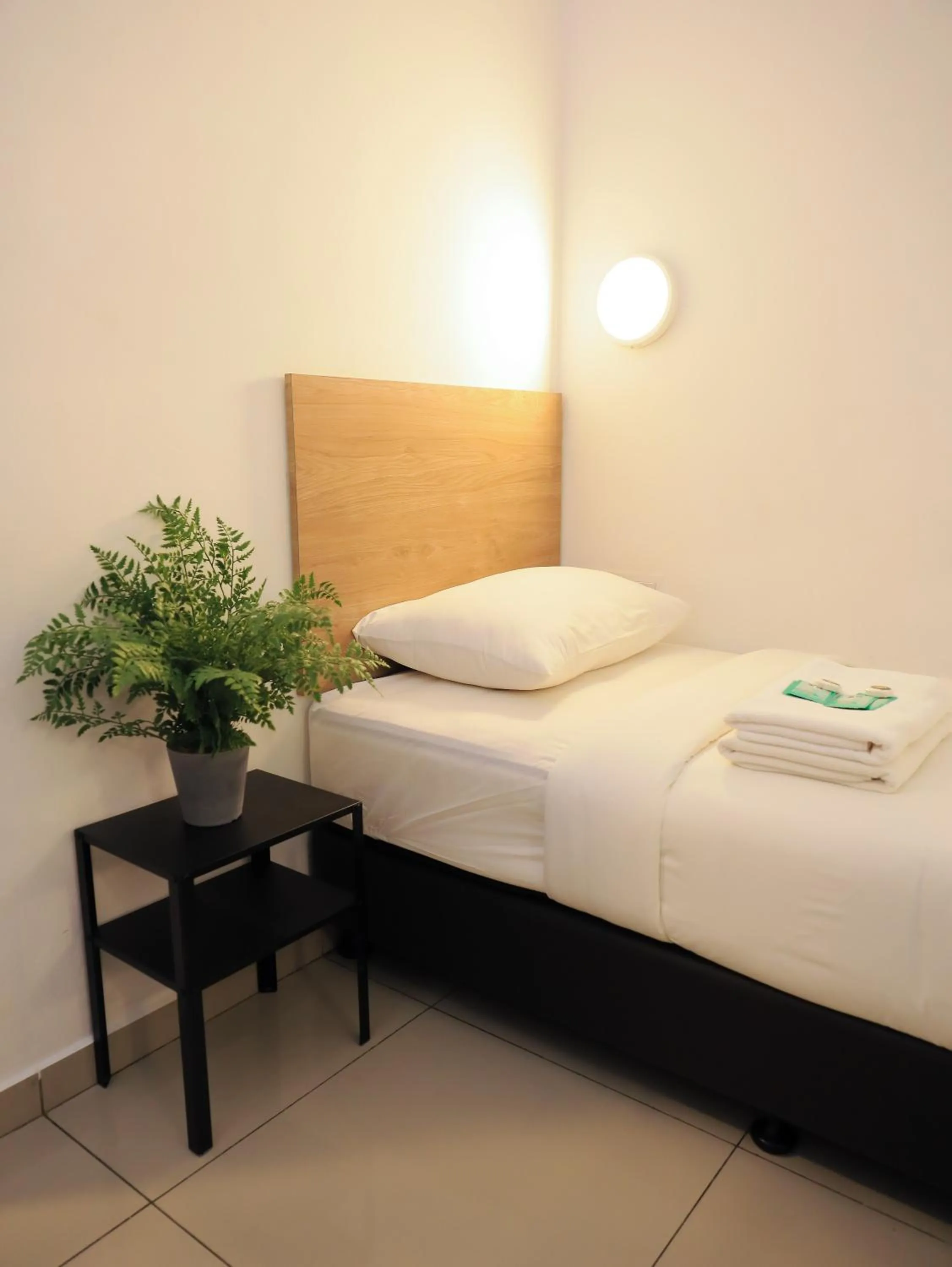 Bed in BIG TREE HOTEL