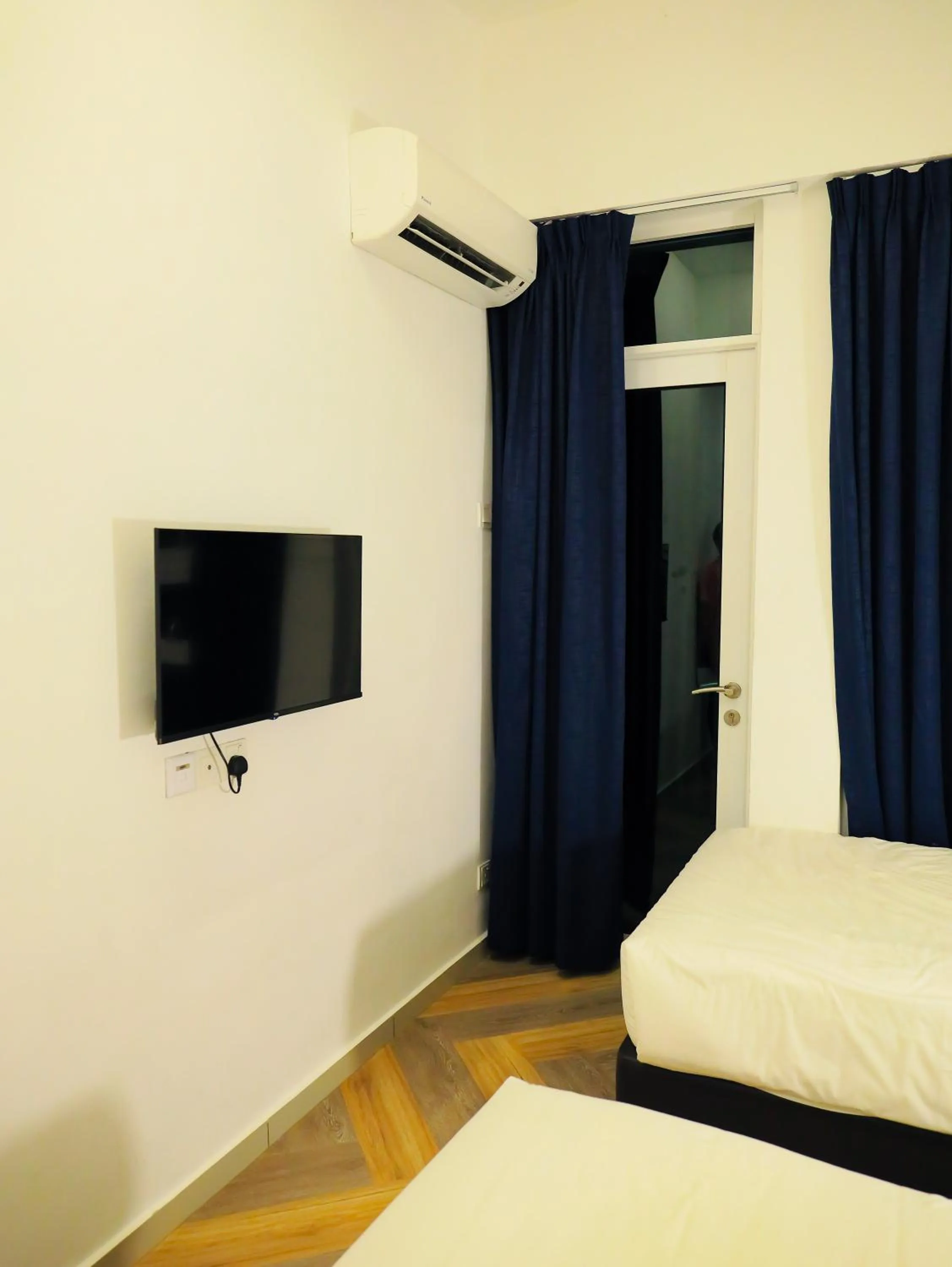 Bed in BIG TREE HOTEL