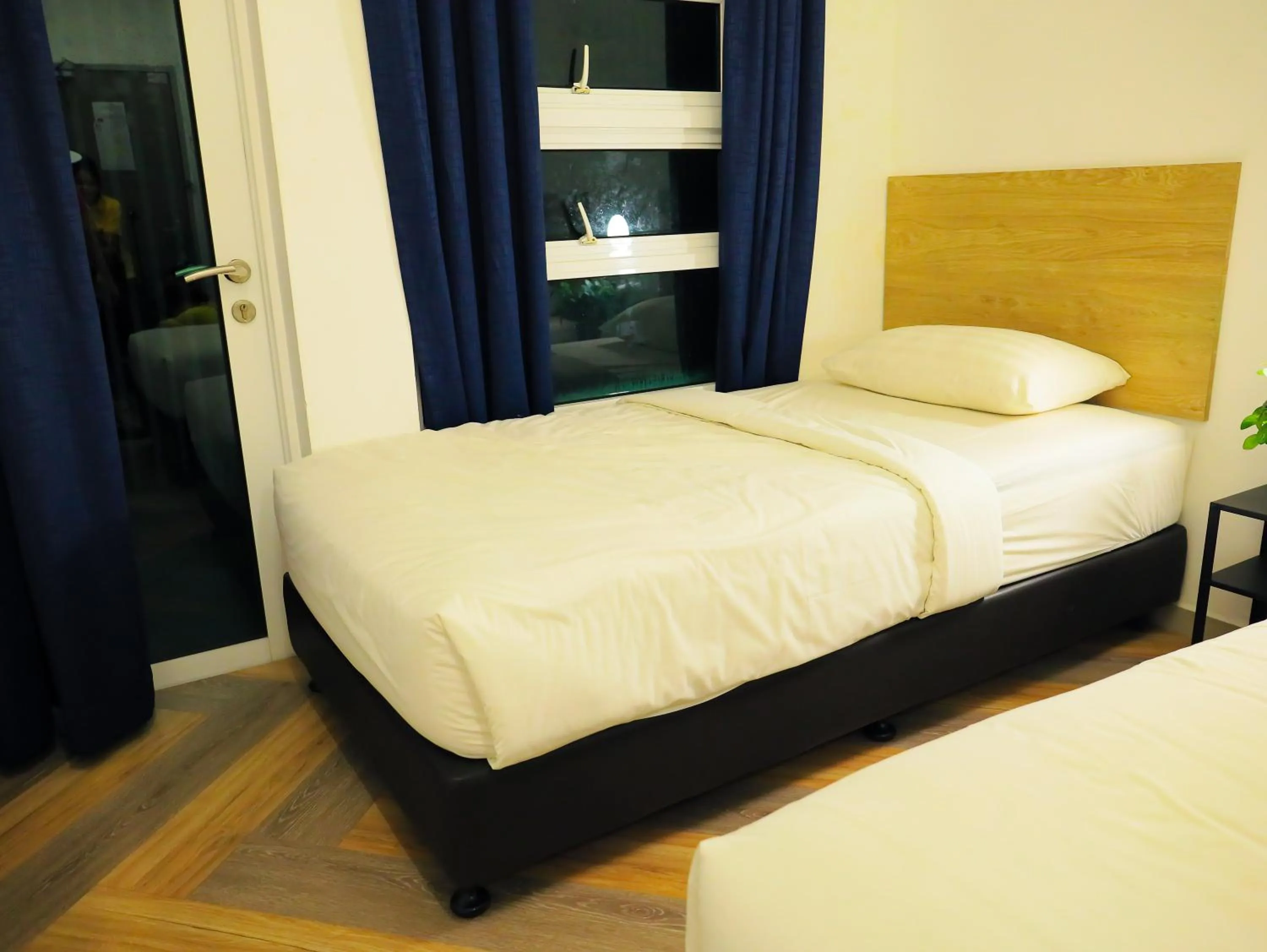 Bed in BIG TREE HOTEL