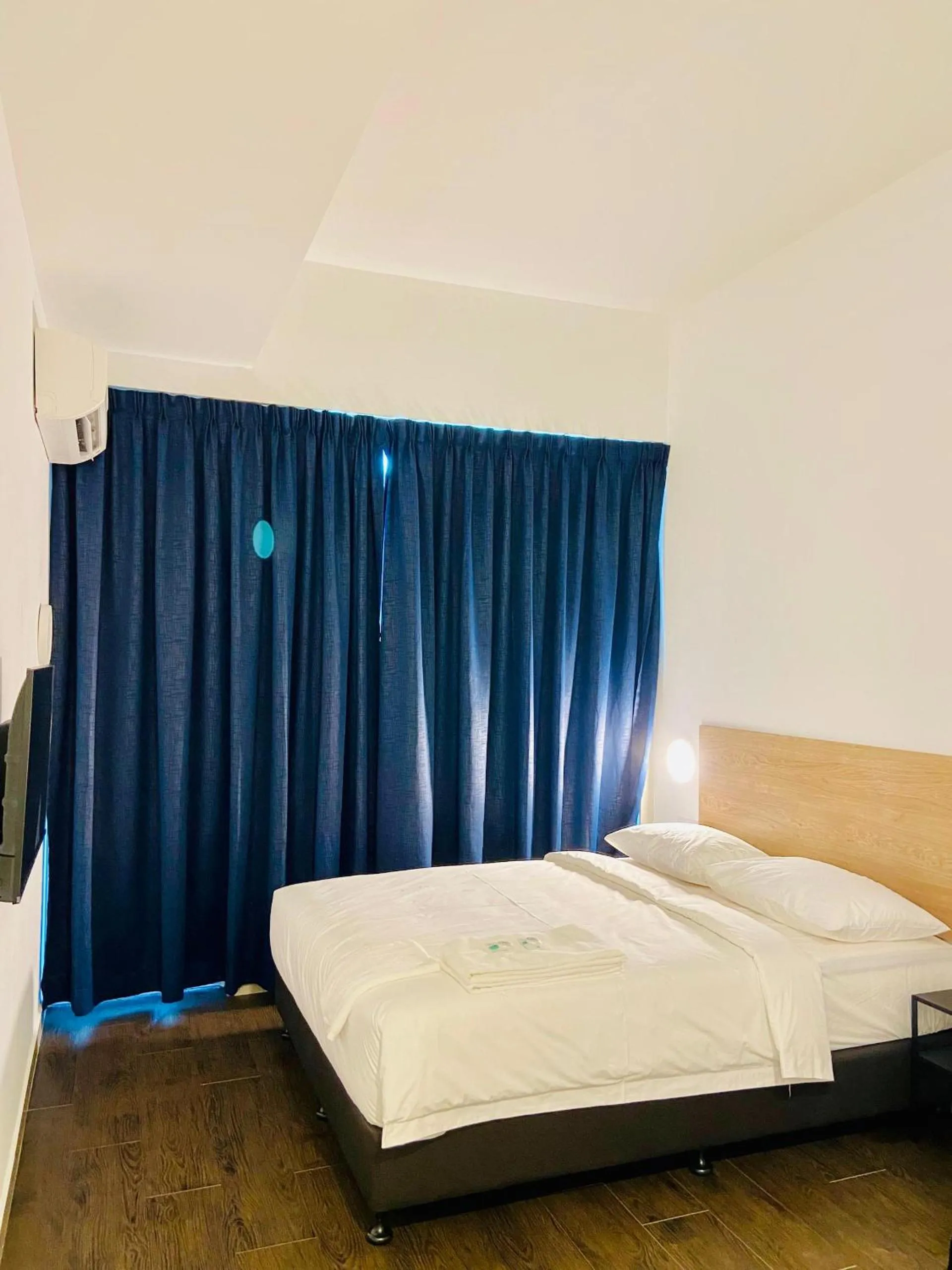 Bed in BIG TREE HOTEL