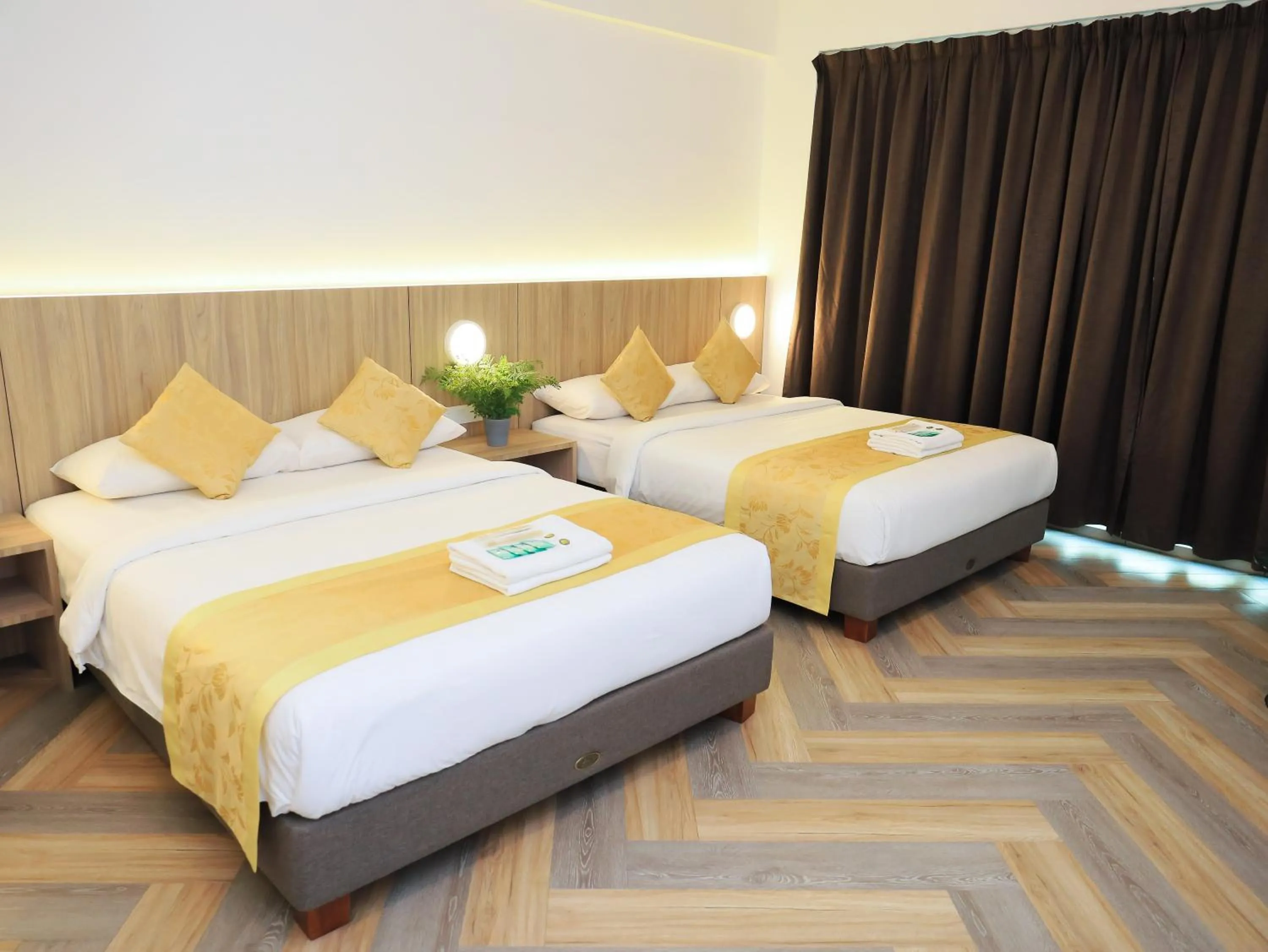 Bed in BIG TREE HOTEL