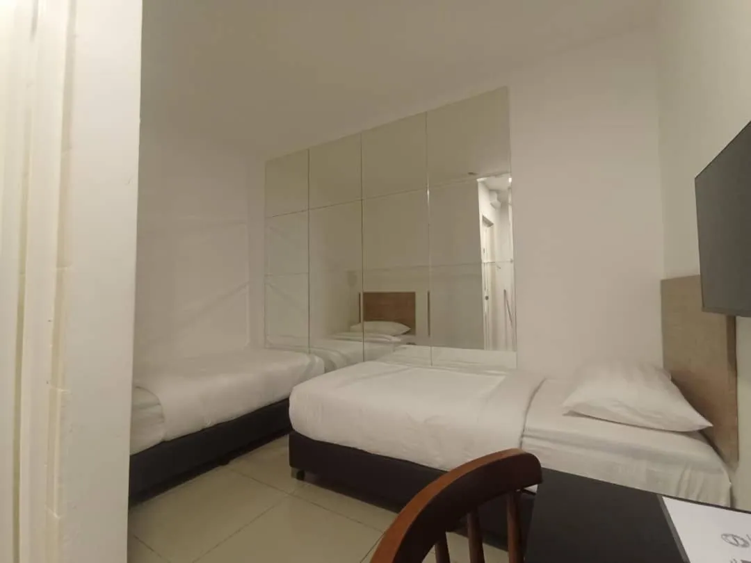 Bed in BIG TREE HOTEL