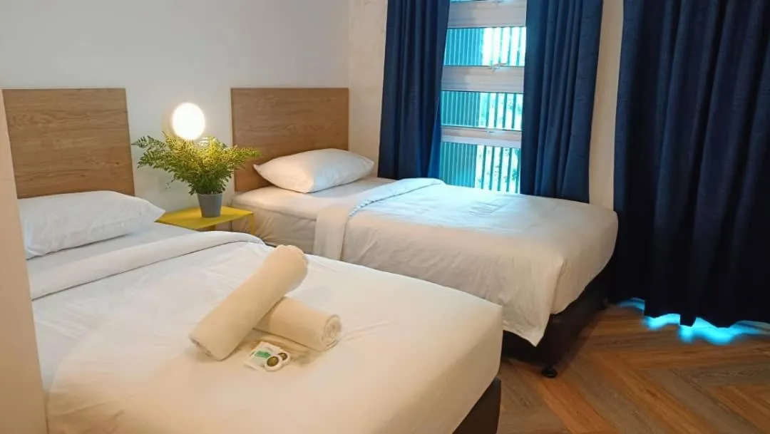 Bed in BIG TREE HOTEL