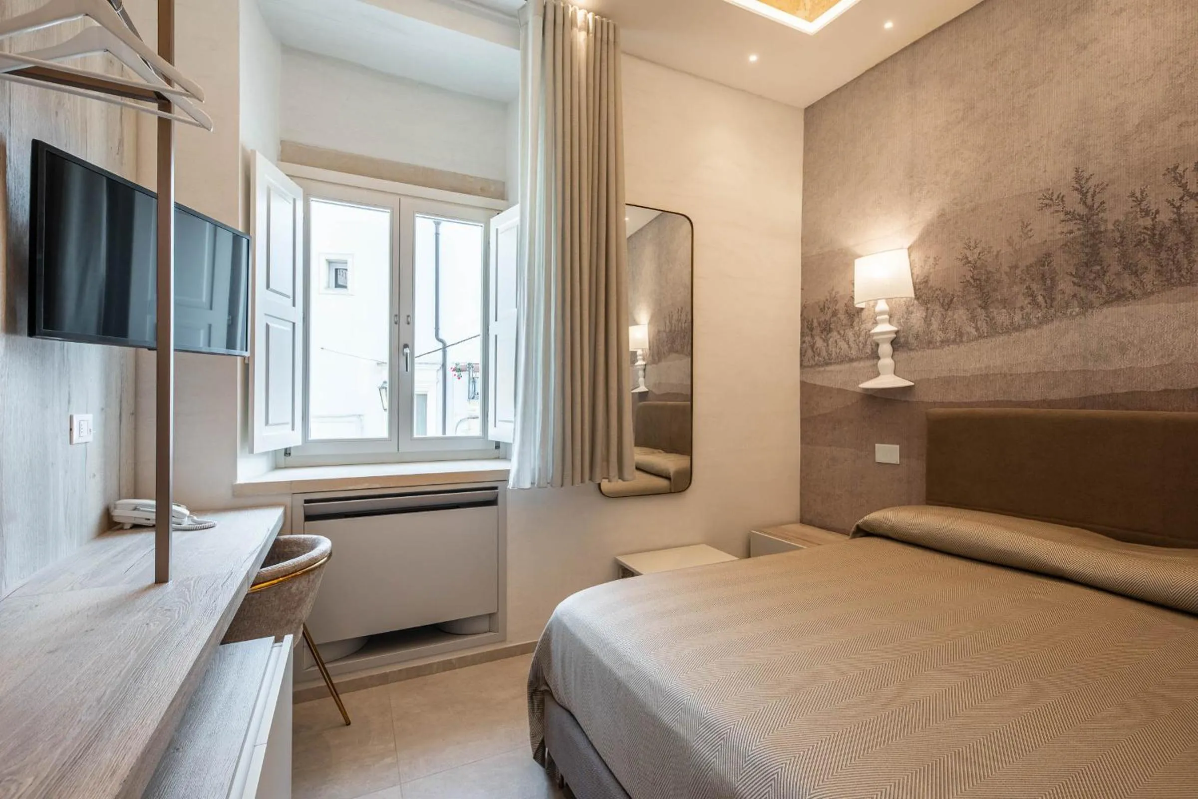 Bed in Palazzo Arco Cadura Hotel & Spa