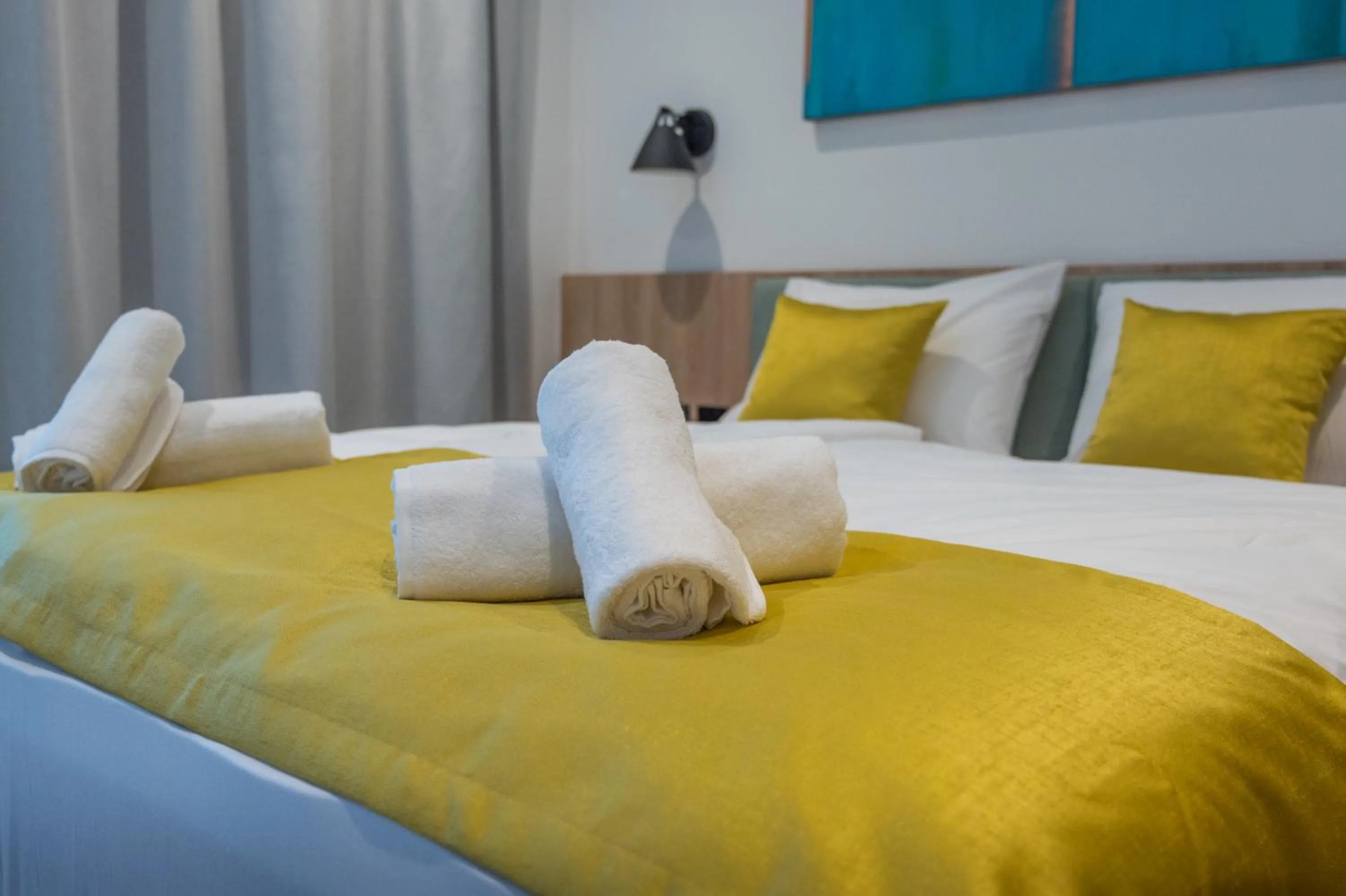 Bed in BJ81 Suite Hotel