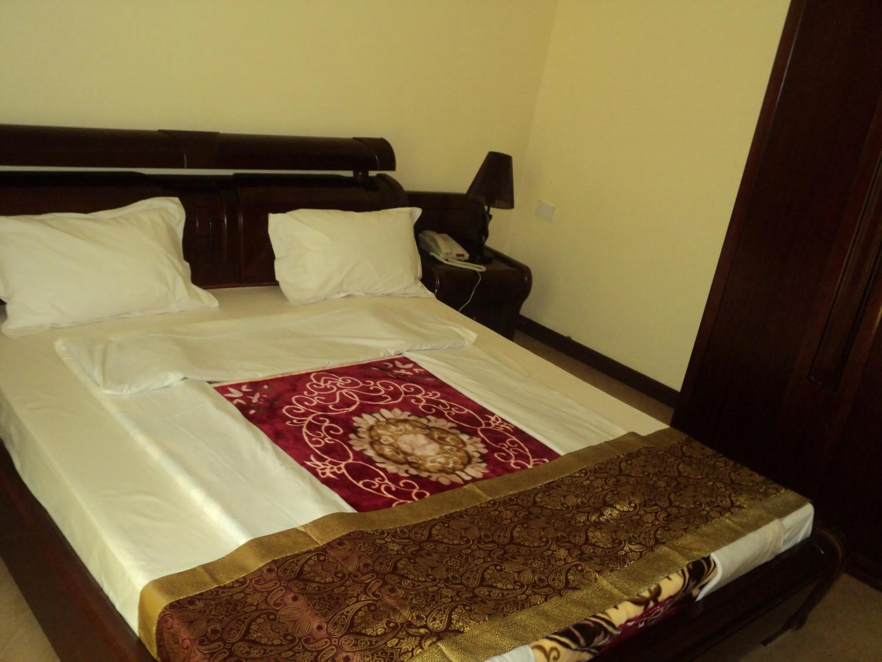 Bed in Biraj International Hotel