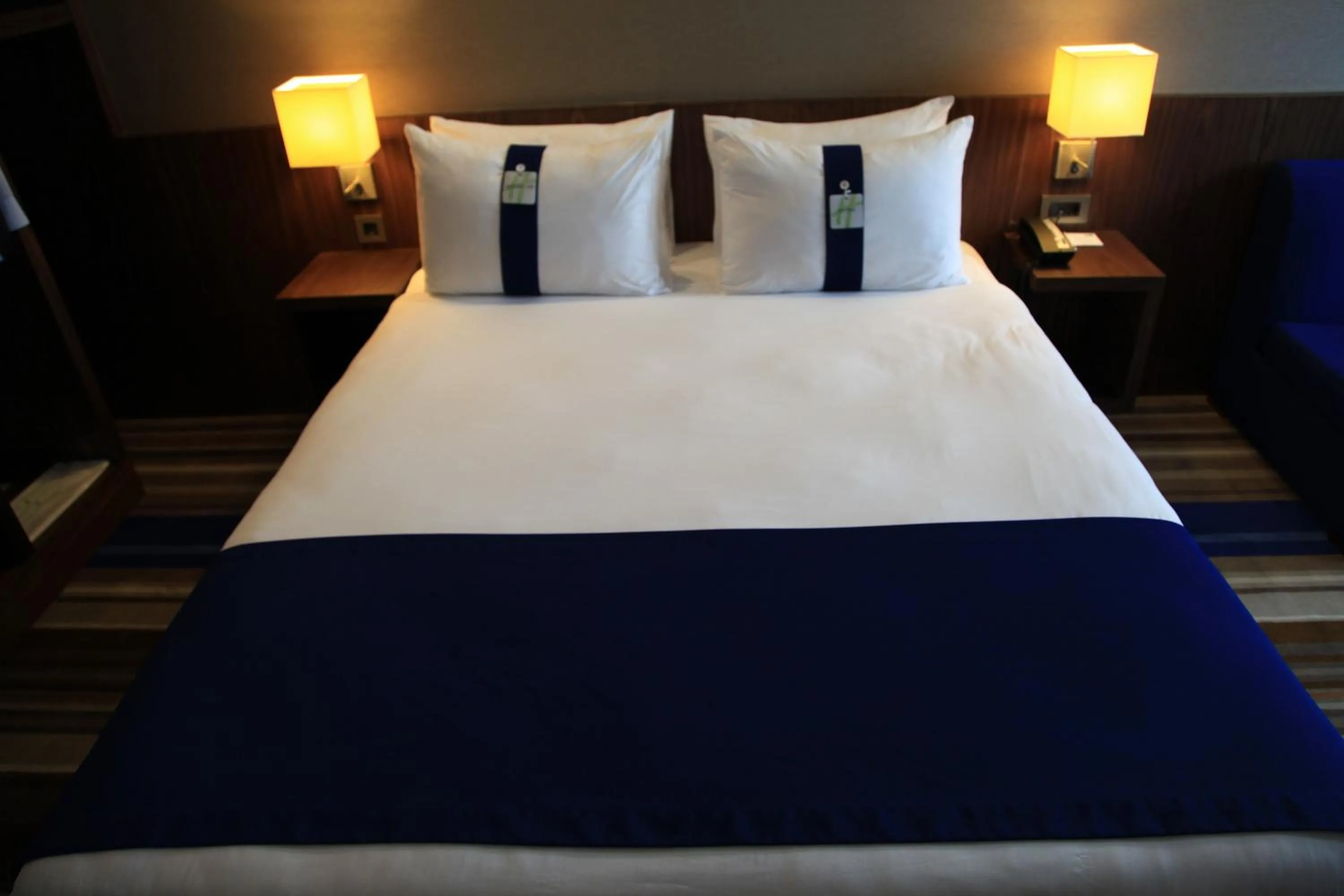 Bed in Liv City Hotels