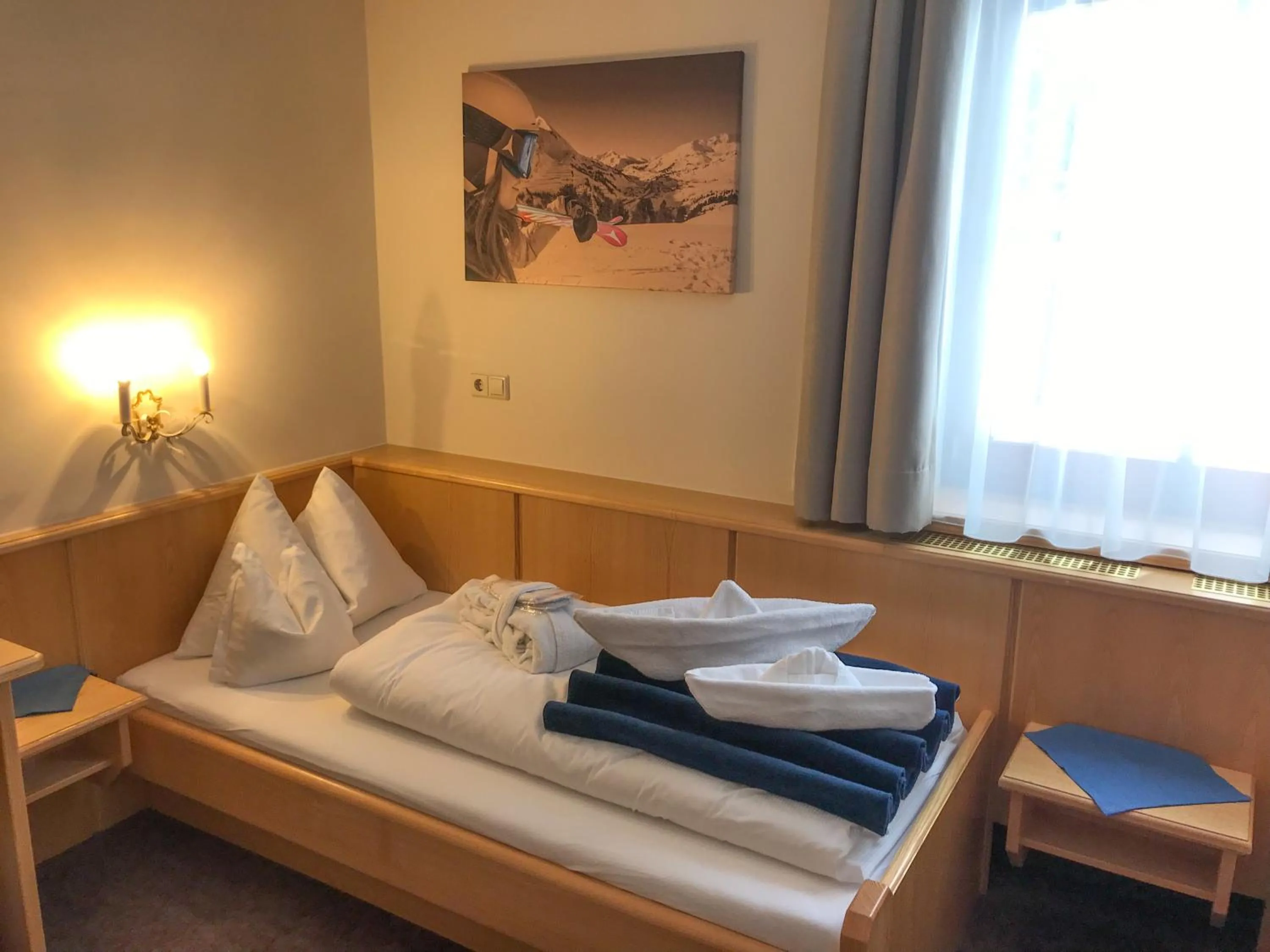 Bed in Andi's Skihotel