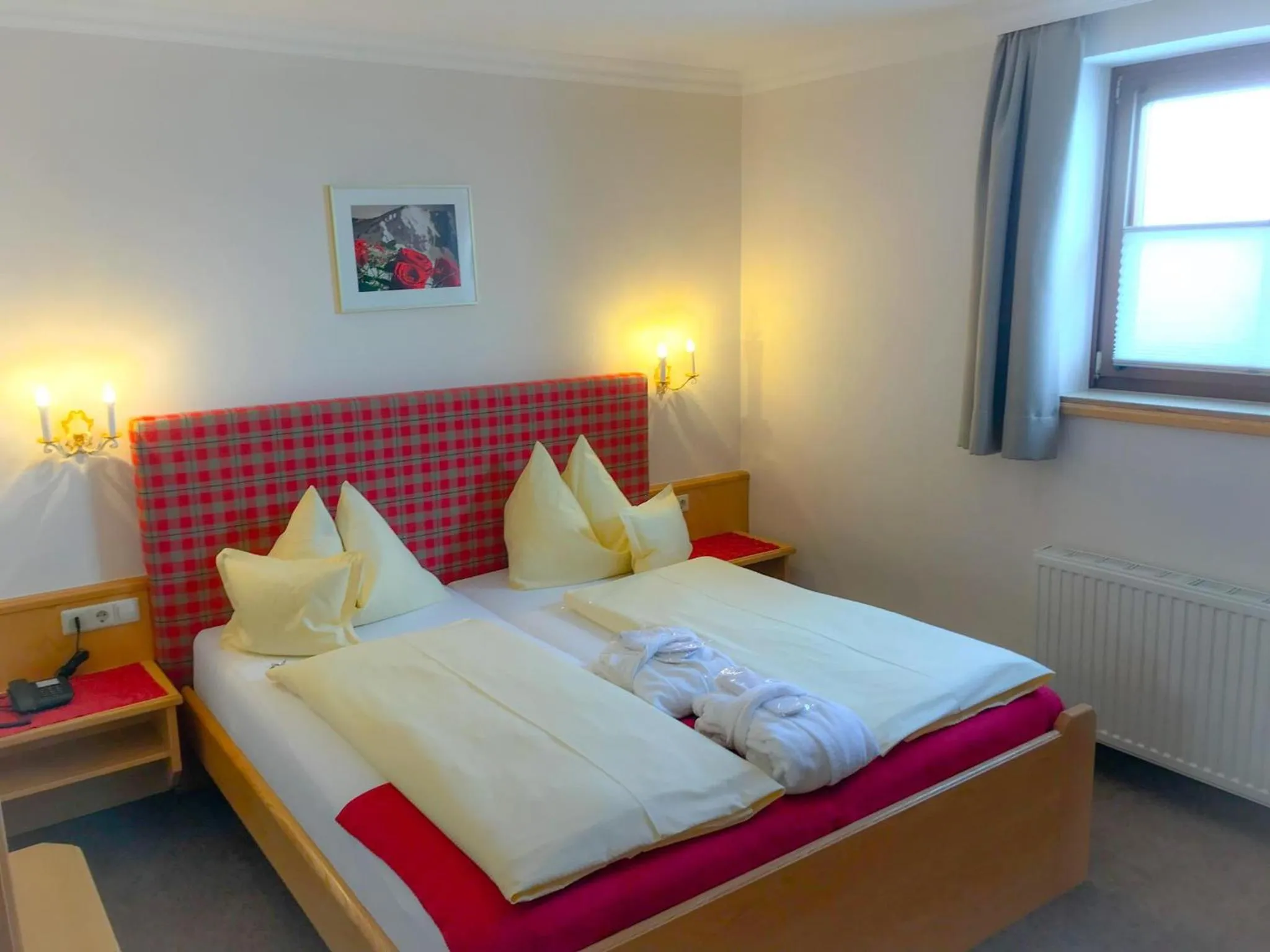 Bed in Andi's Skihotel