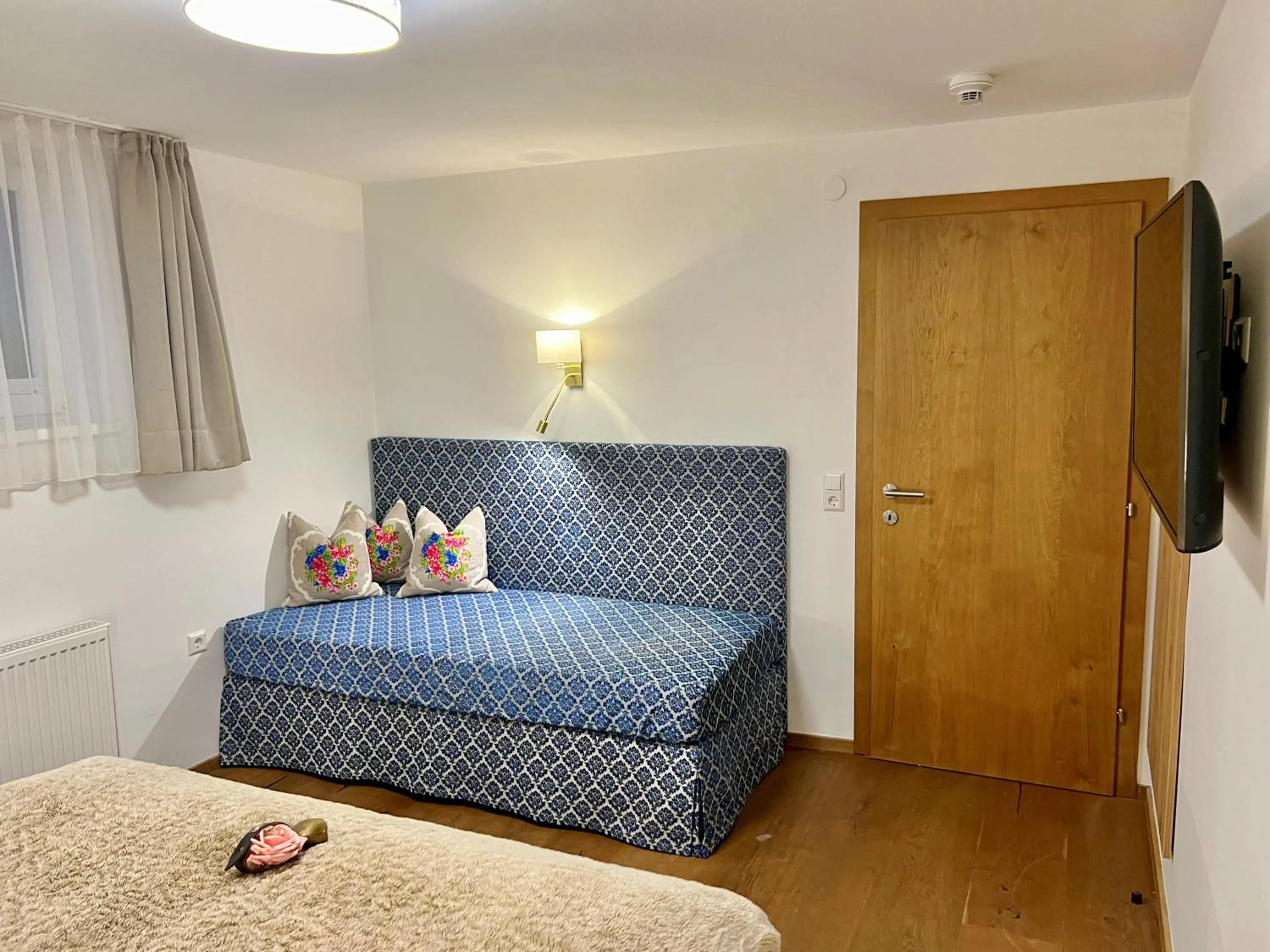 Bedroom in Andi's Skihotel