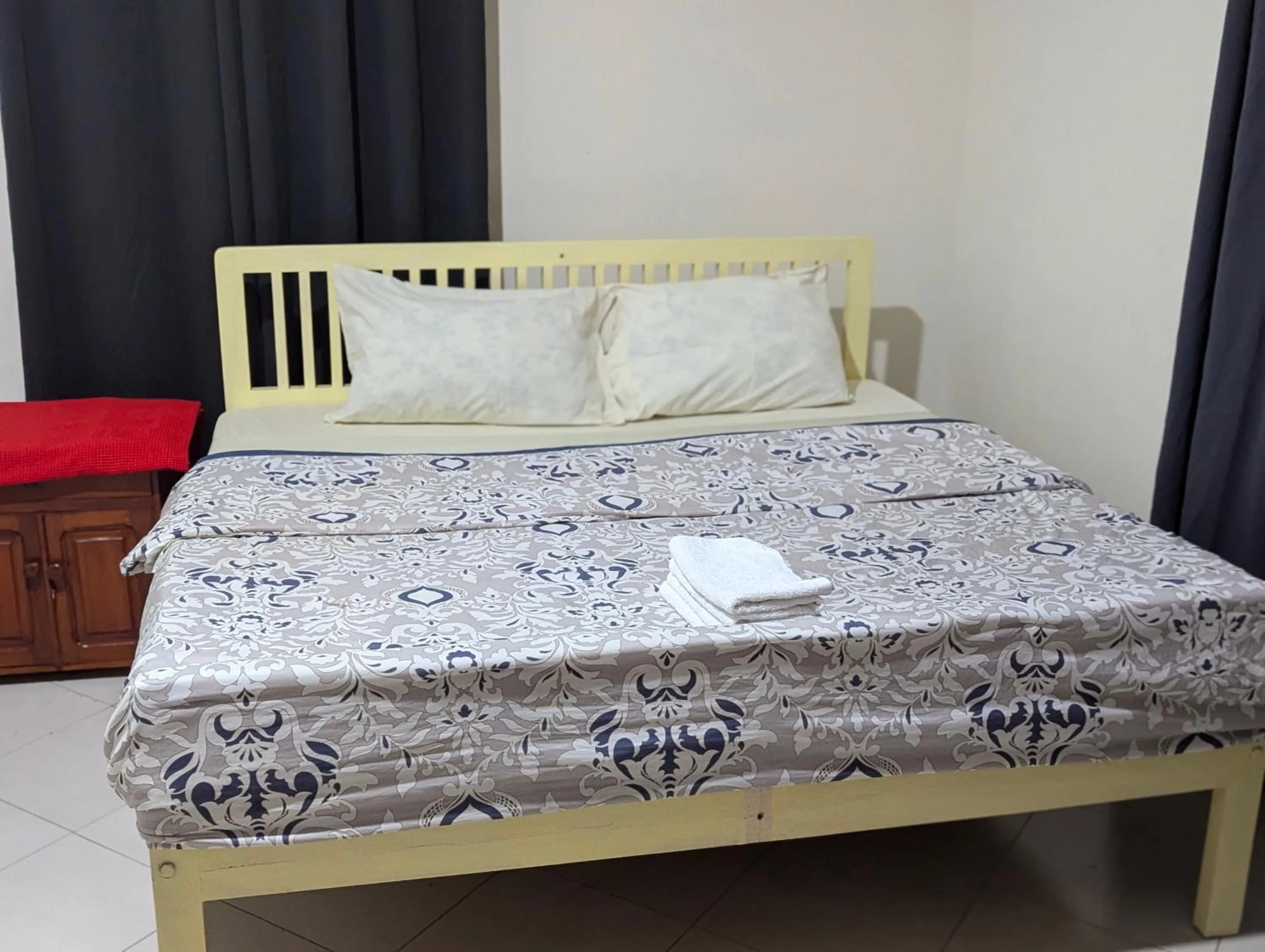 Bed in JACARANDA HOMESTAY