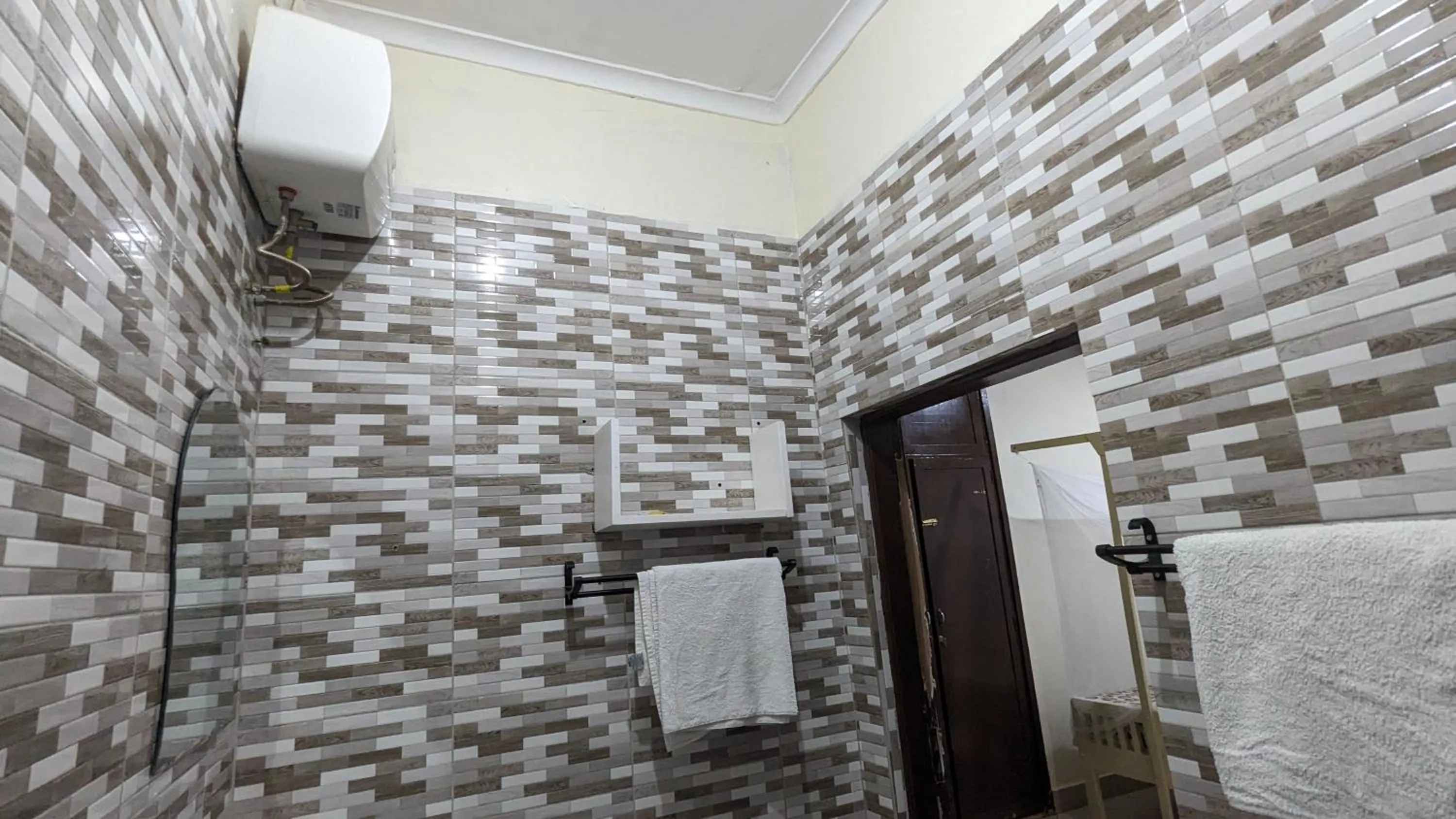 Shower in JACARANDA HOMESTAY