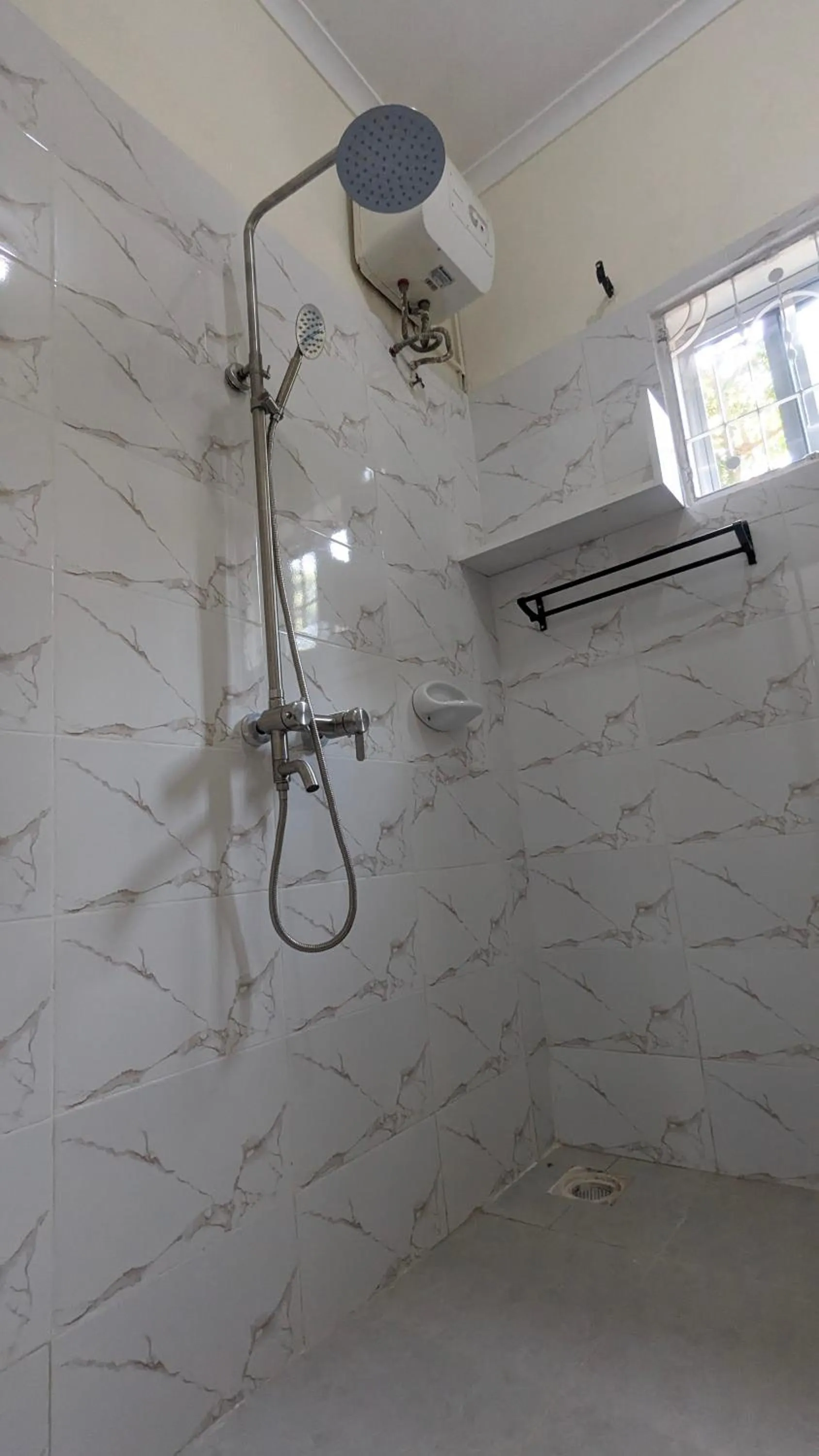 Shower in JACARANDA HOMESTAY