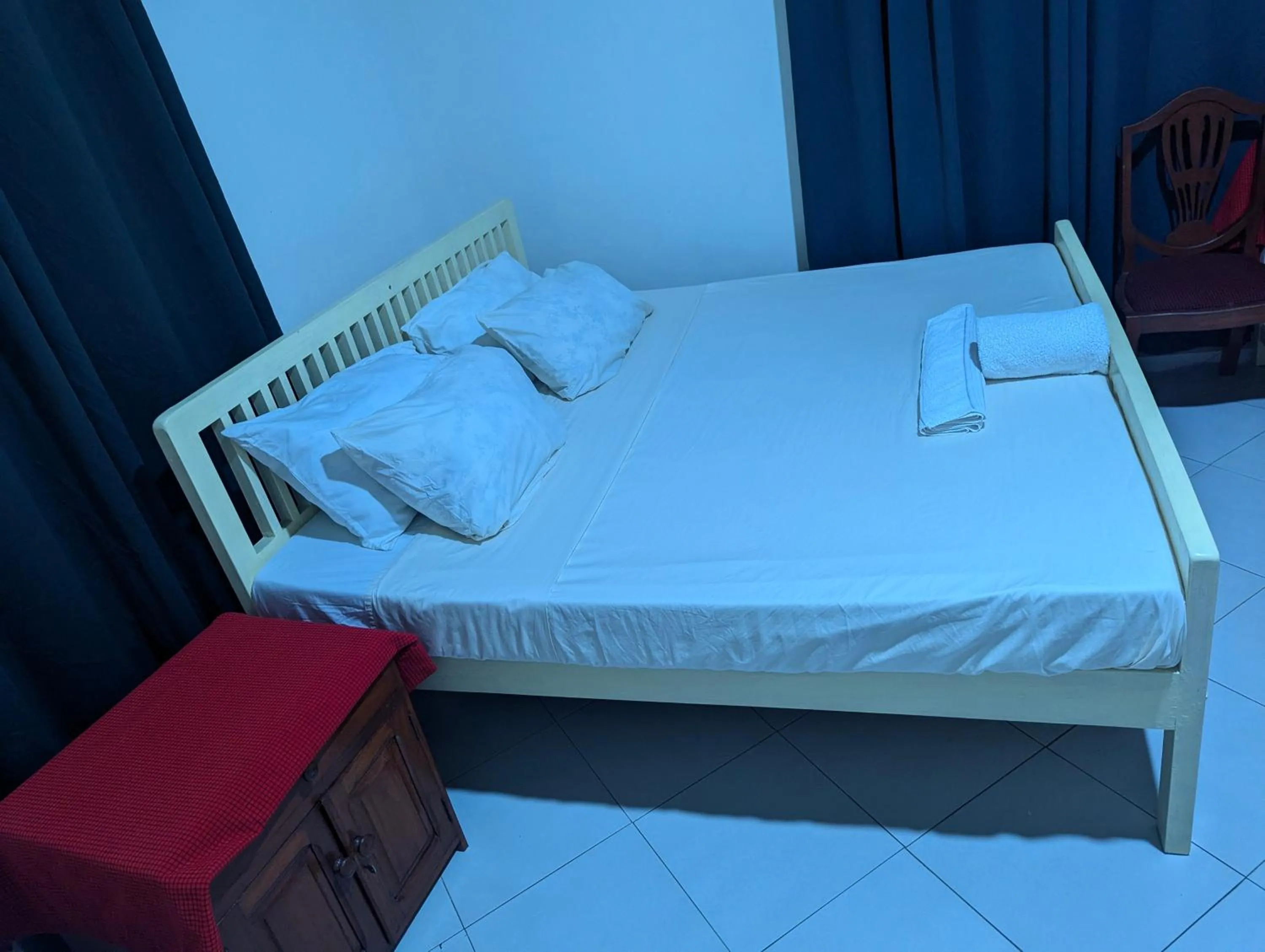 Bed in JACARANDA HOMESTAY