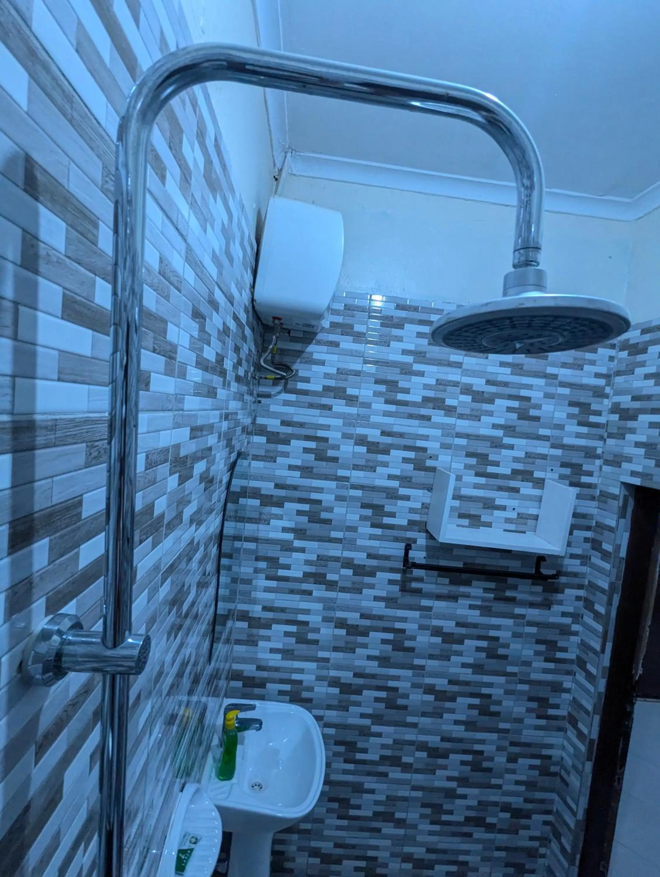 Shower in JACARANDA HOMESTAY