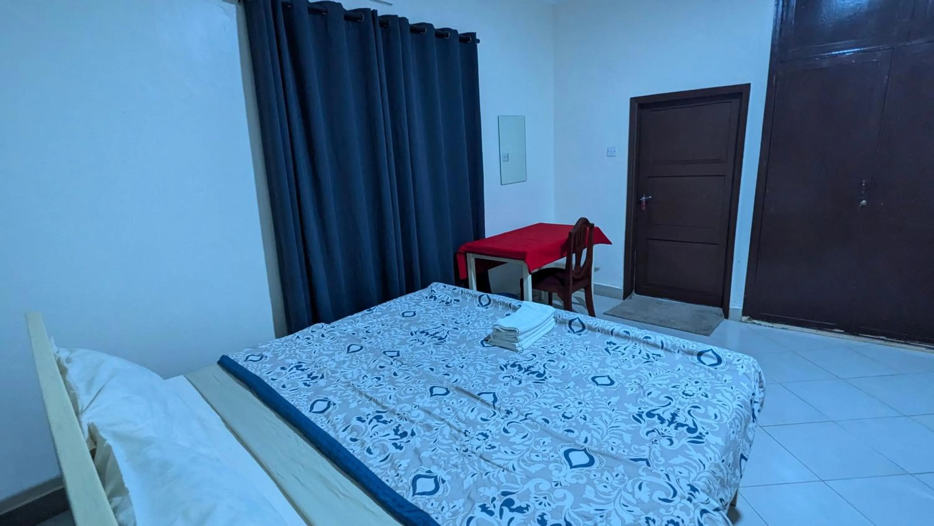 Bed in JACARANDA HOMESTAY