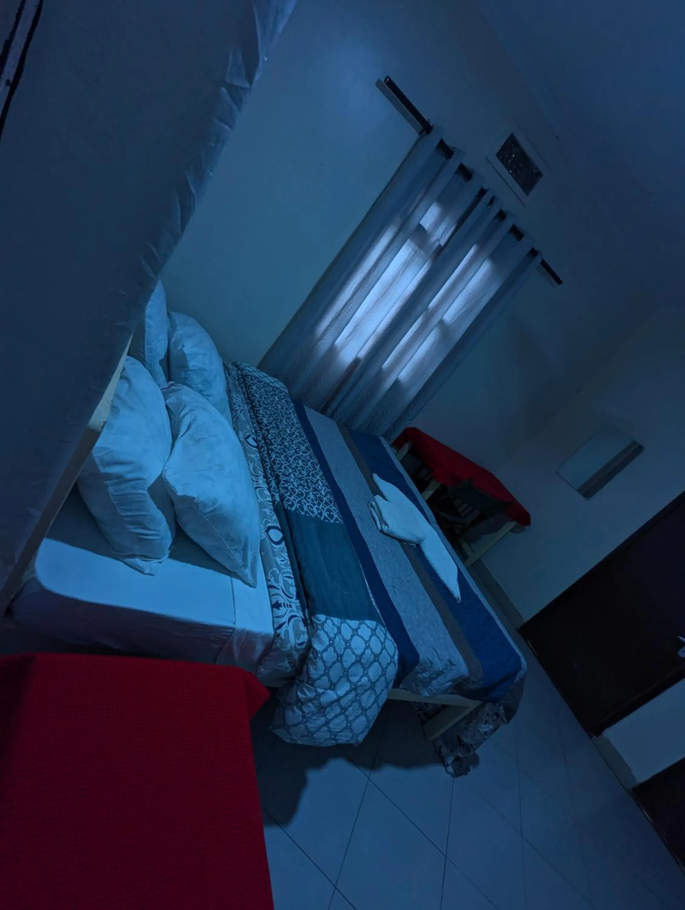 Bed in JACARANDA HOMESTAY