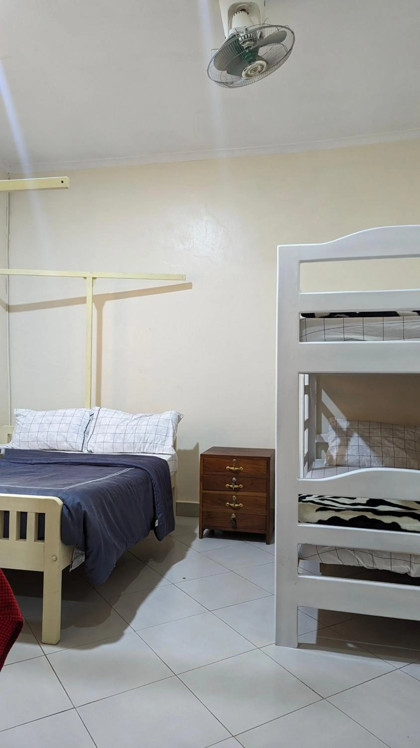 Bed in JACARANDA HOMESTAY