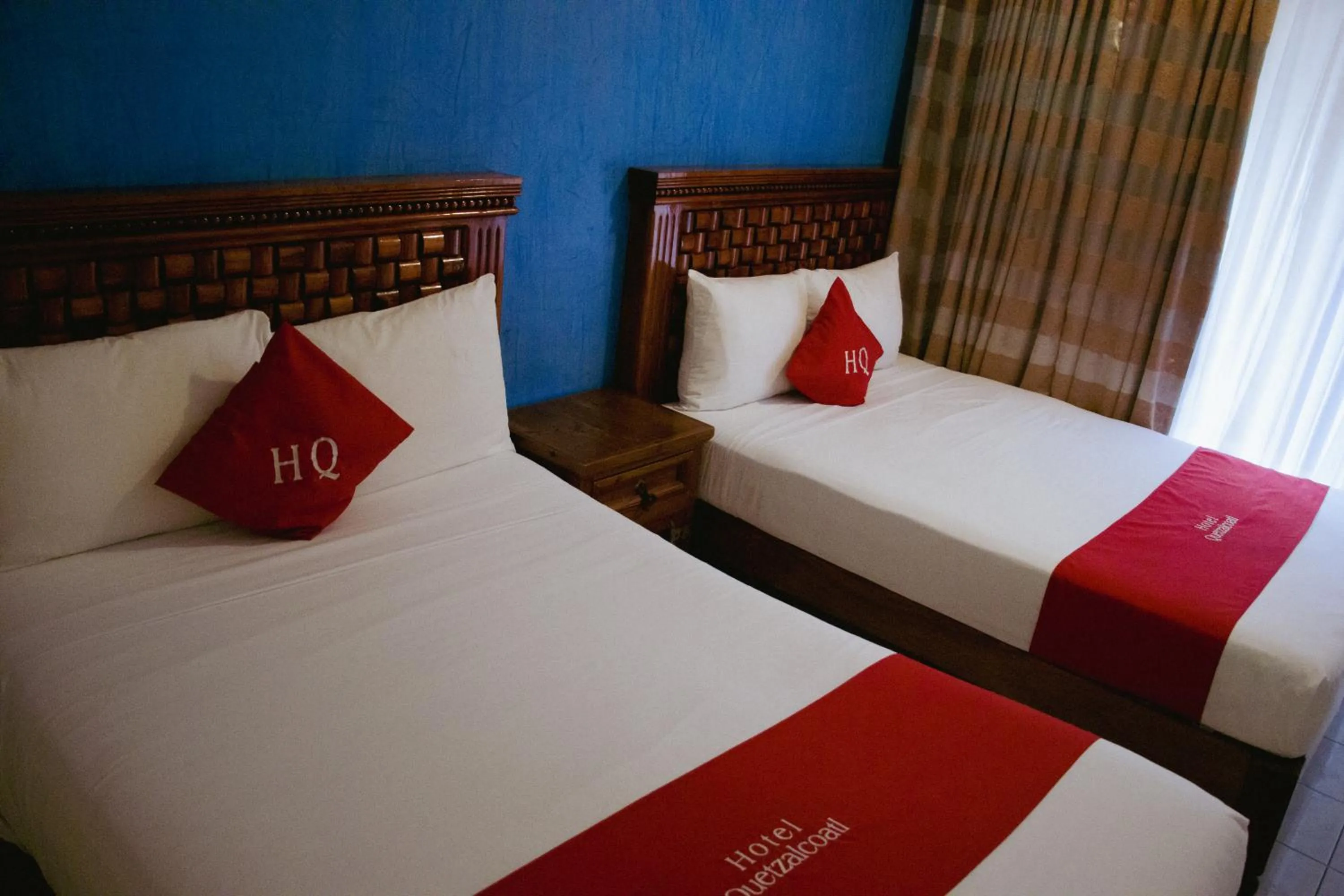 Bed in Hotel Quetzalcóatl