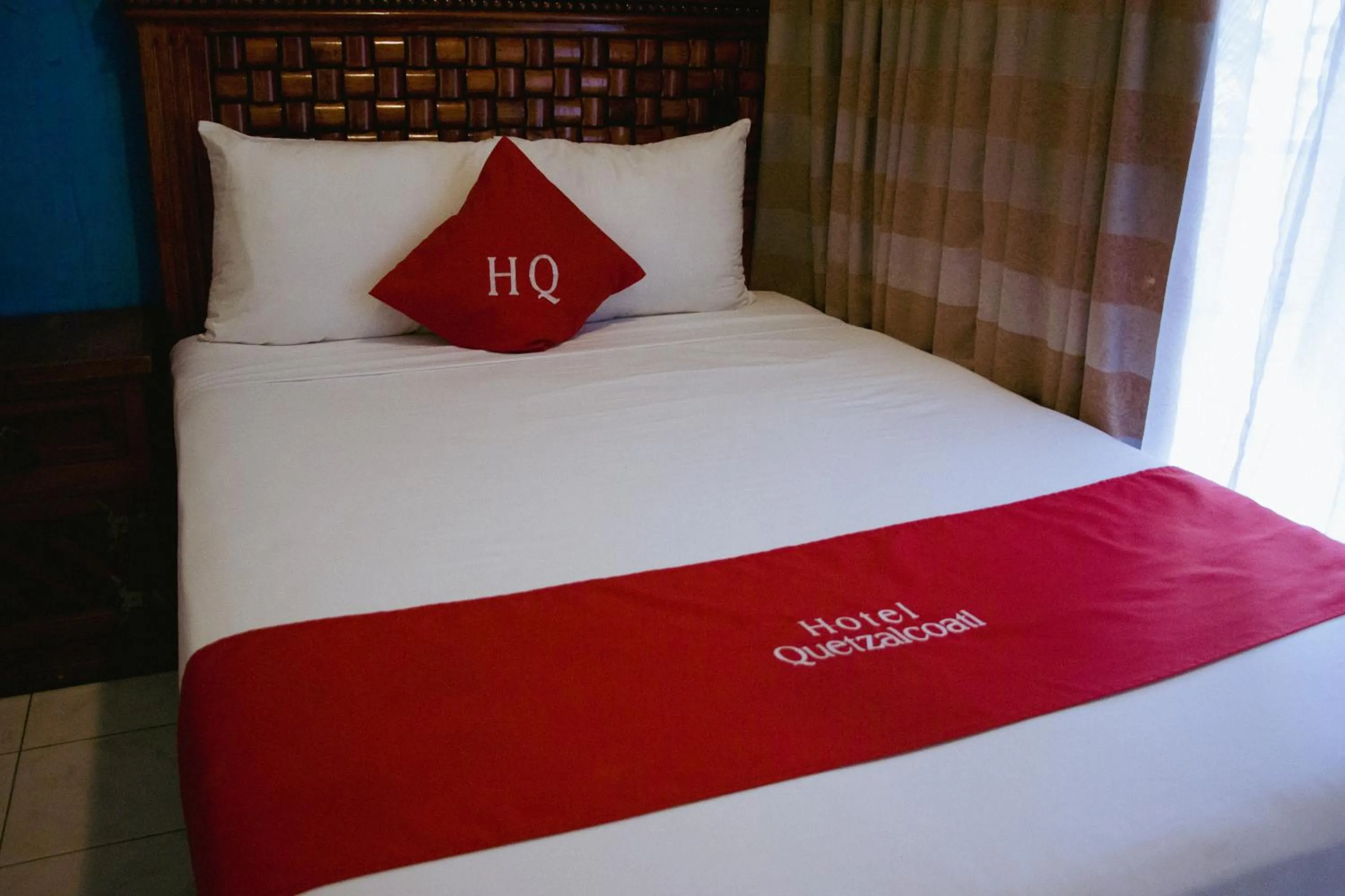 Bed in Hotel Quetzalcóatl