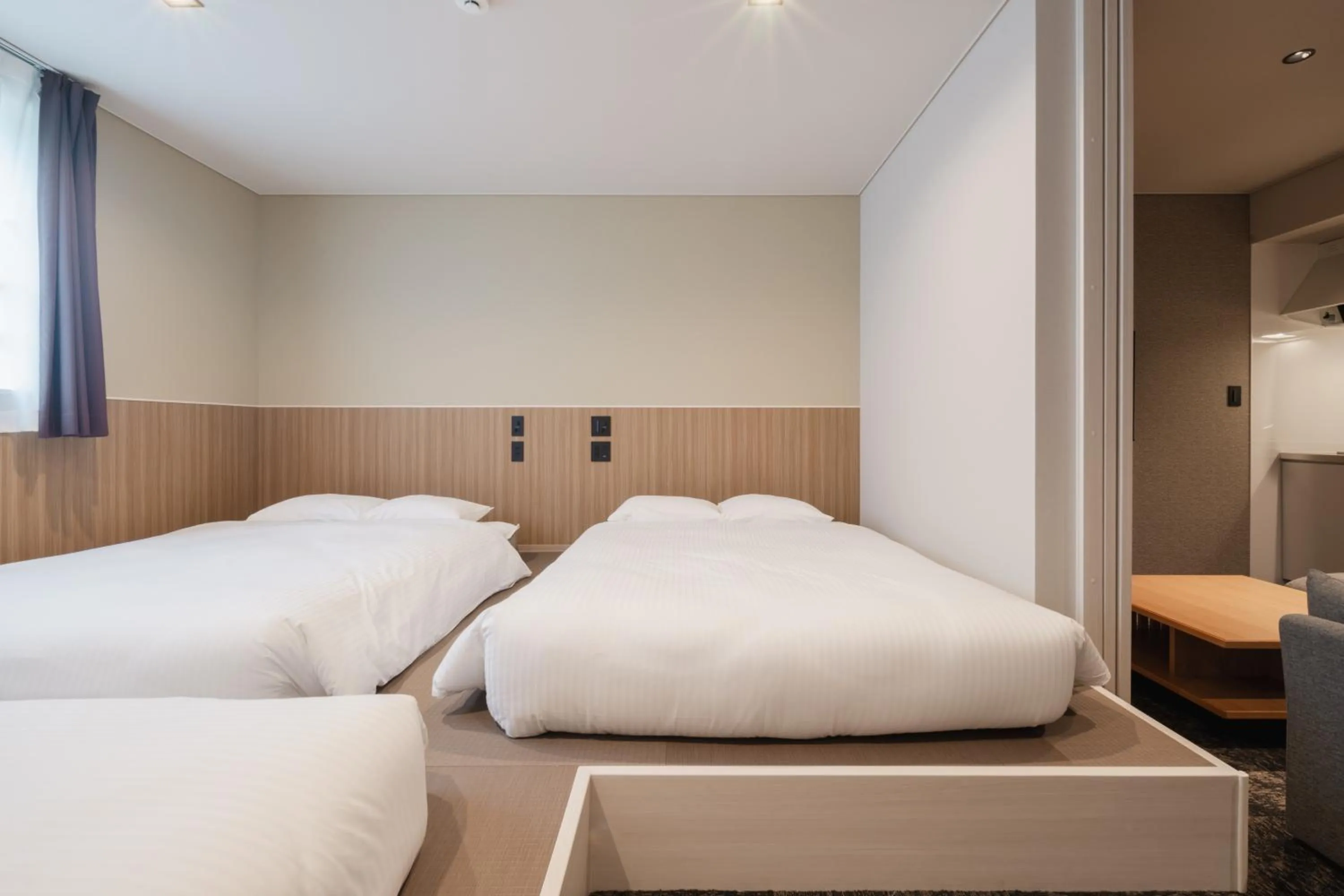 Bed in Hotel Ninestates Kagoshima